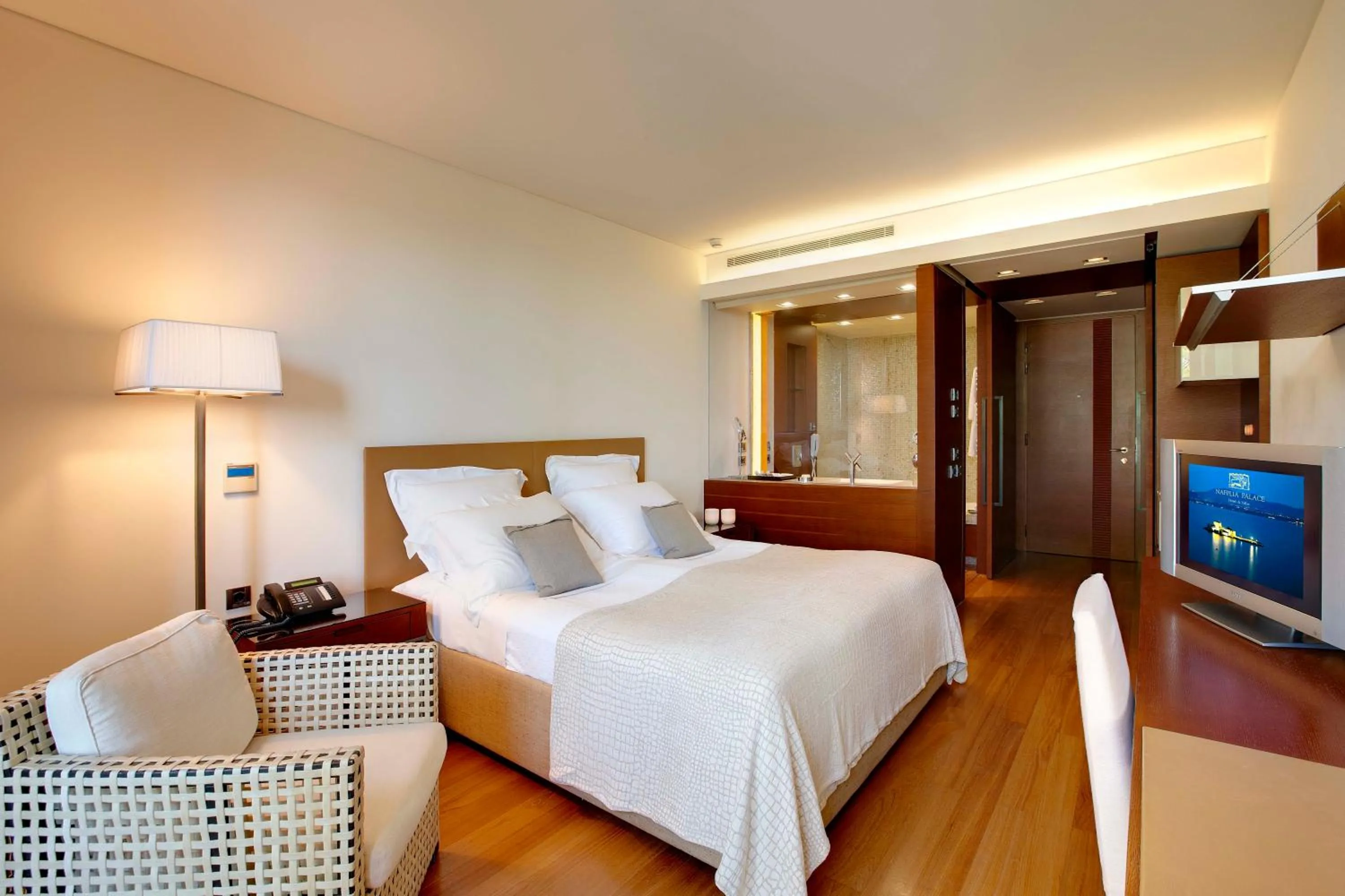 Photo of the whole room, Bed in Nafplia Palace Hotel & Villas