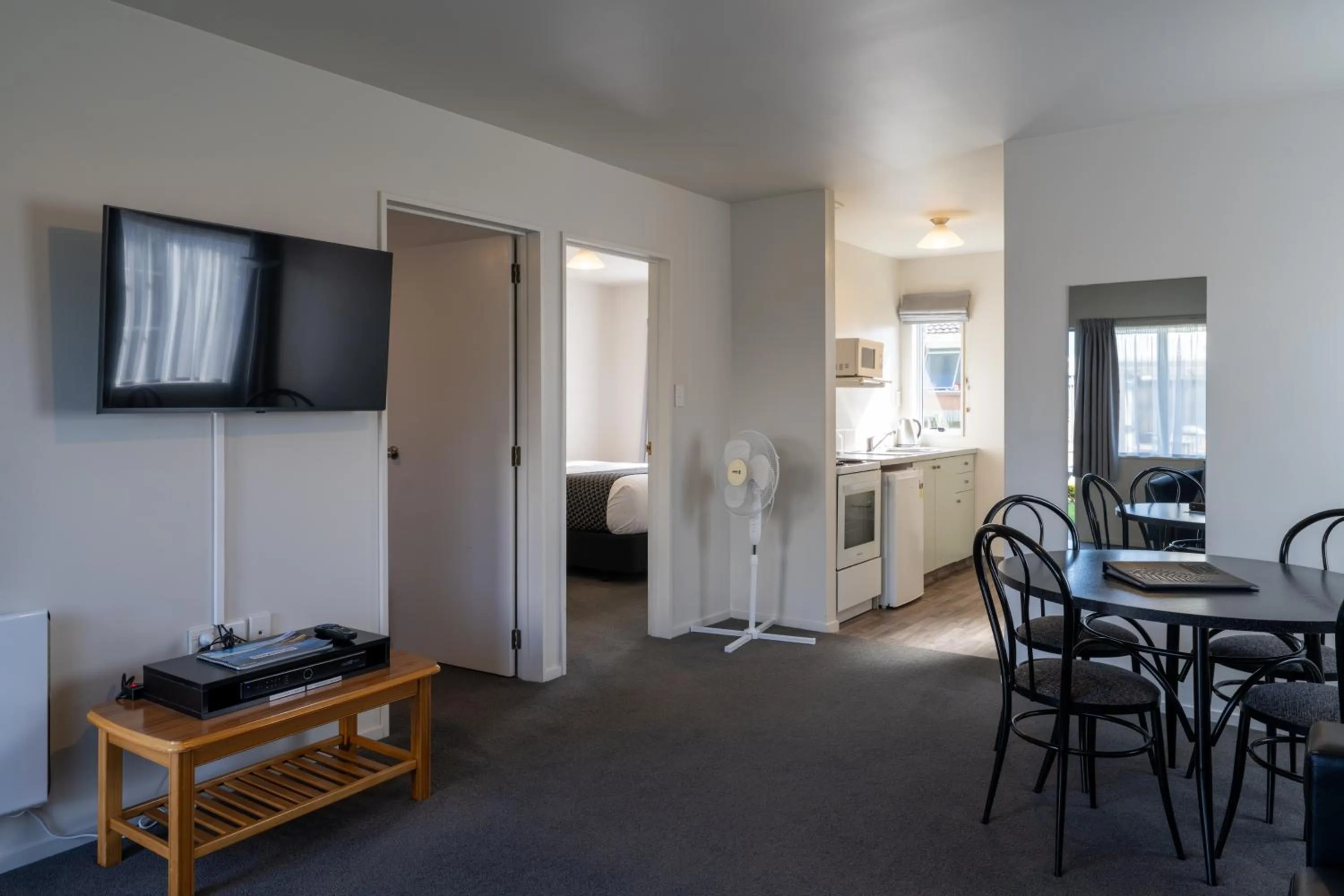 Living room in ASURE Gables Motor Lodge