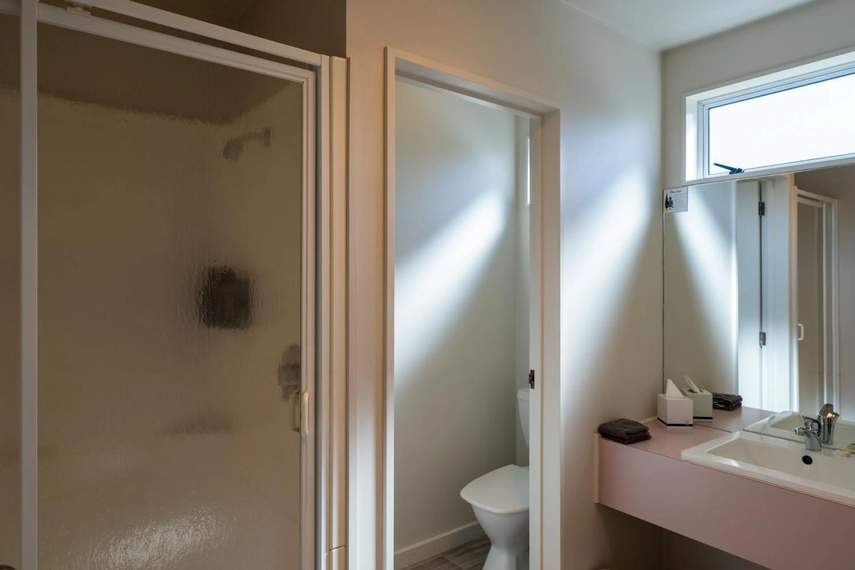 Shower in ASURE Gables Motor Lodge