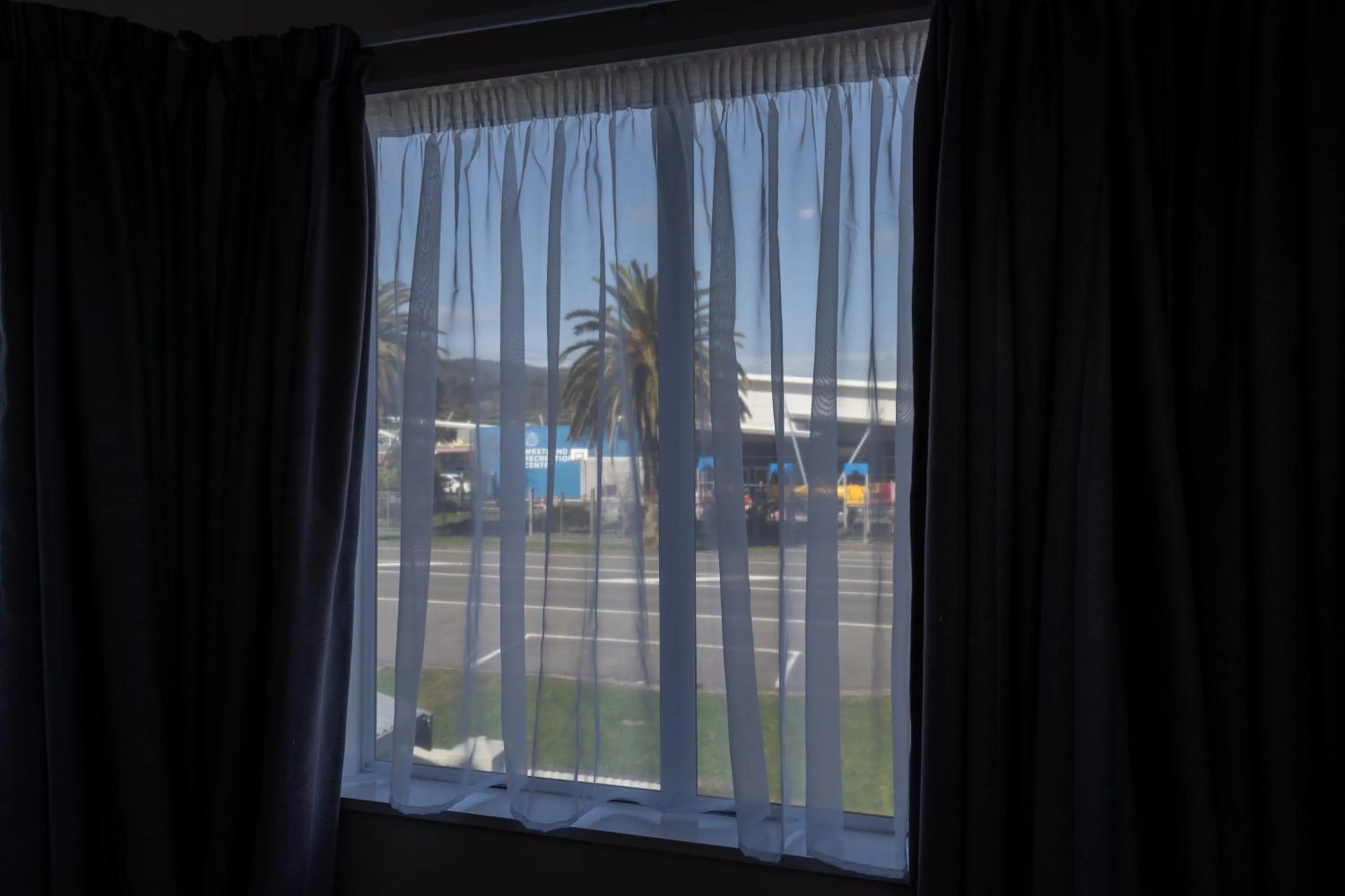 Bedroom in ASURE Gables Motor Lodge