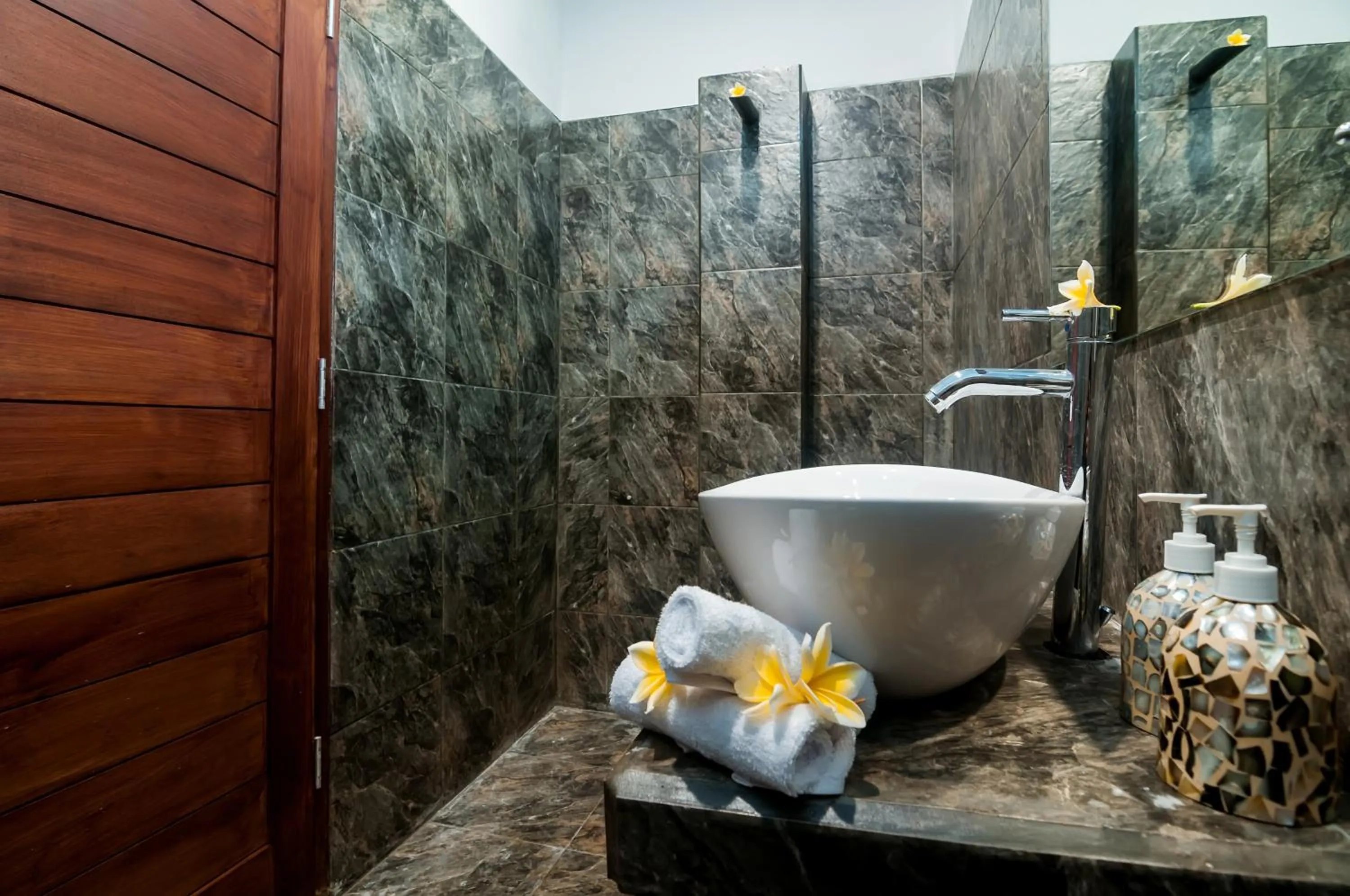 Bathroom in Mawar Estate by Villas Direct Bali