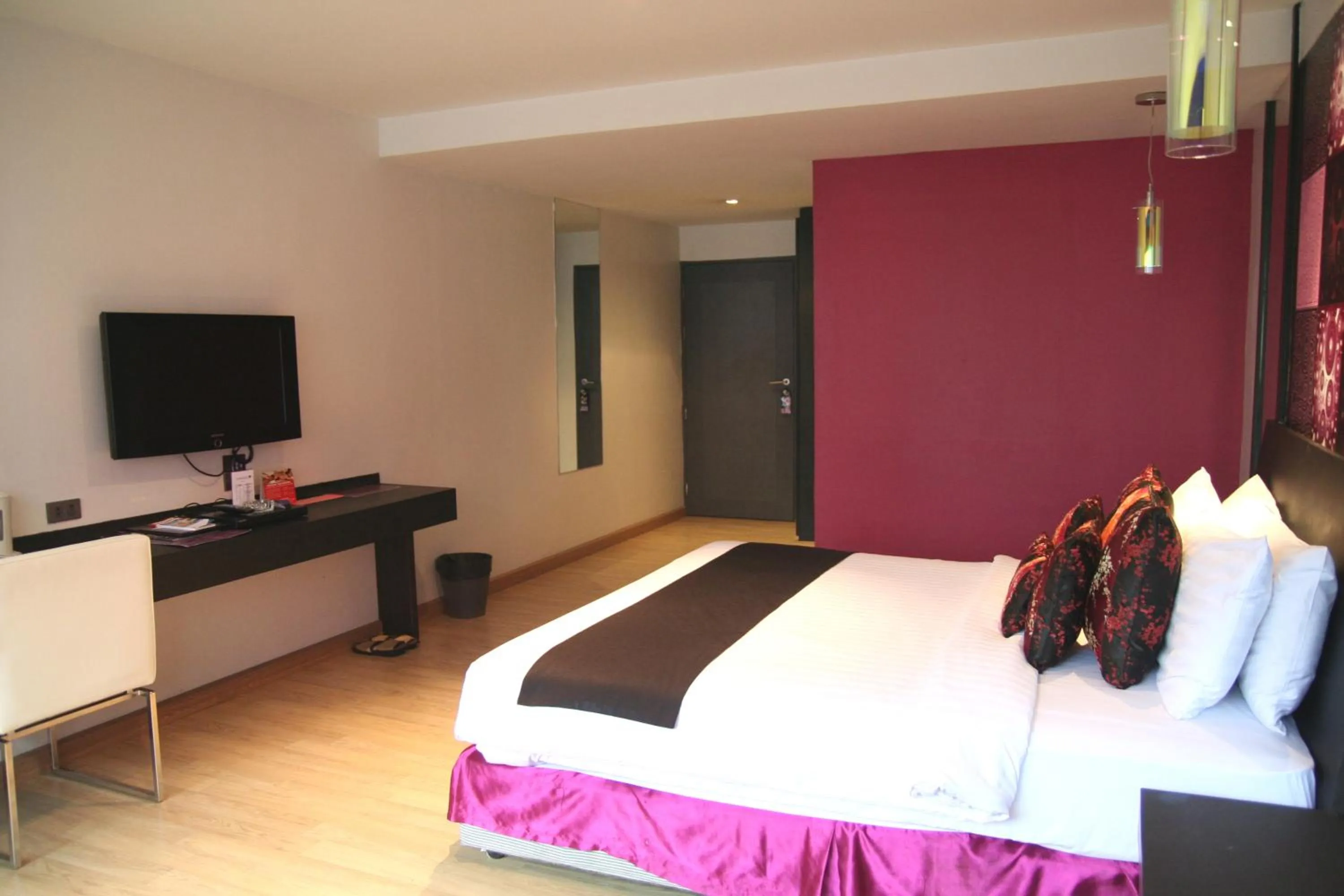 Bed in Grand Inn Hotel