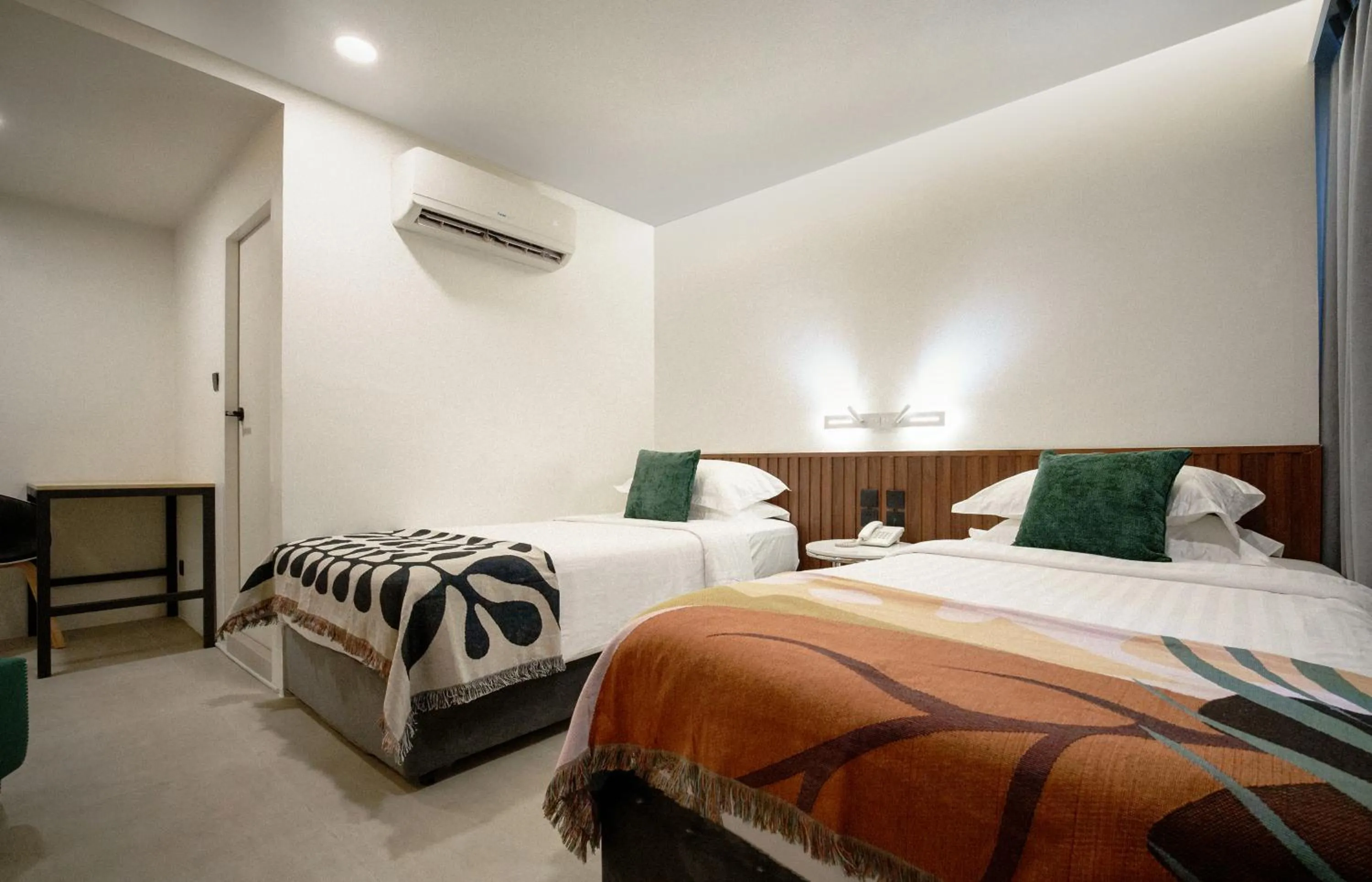 Bed in Grand Inn Hotel