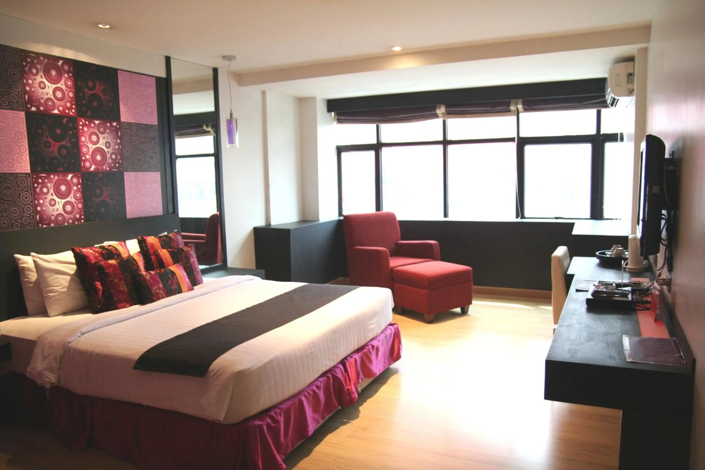 Bed in Grand Inn Hotel