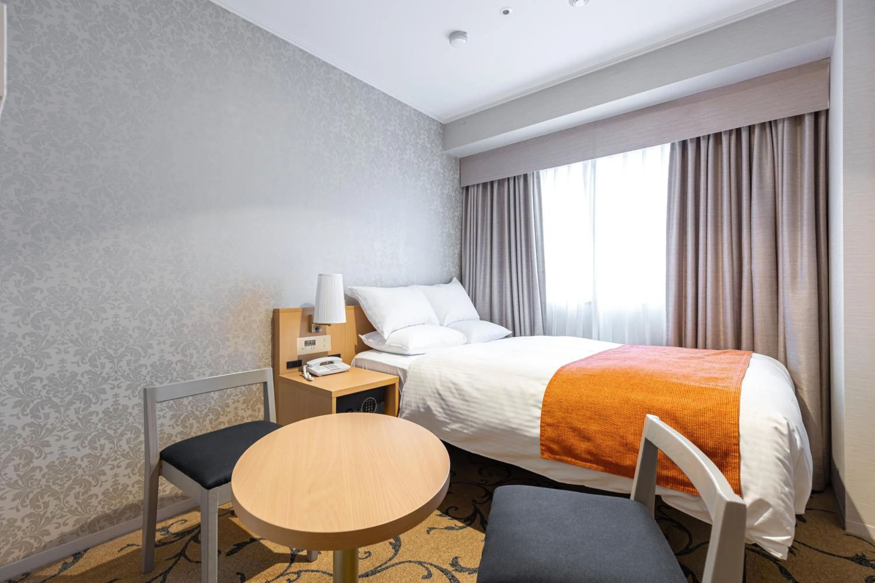 Bed in Hotel Rose Garden Shinjuku