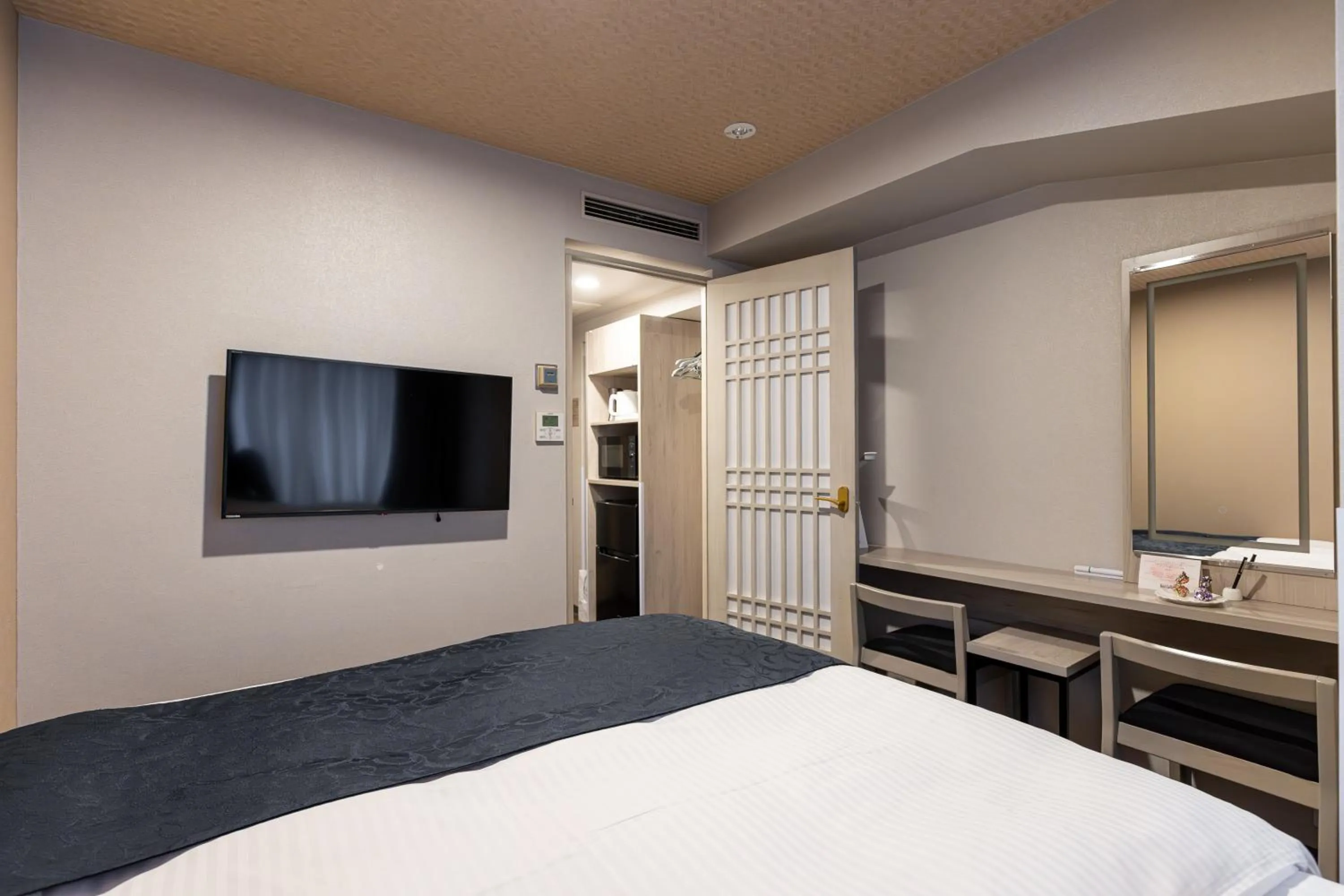 Bed in Hotel Rose Garden Shinjuku