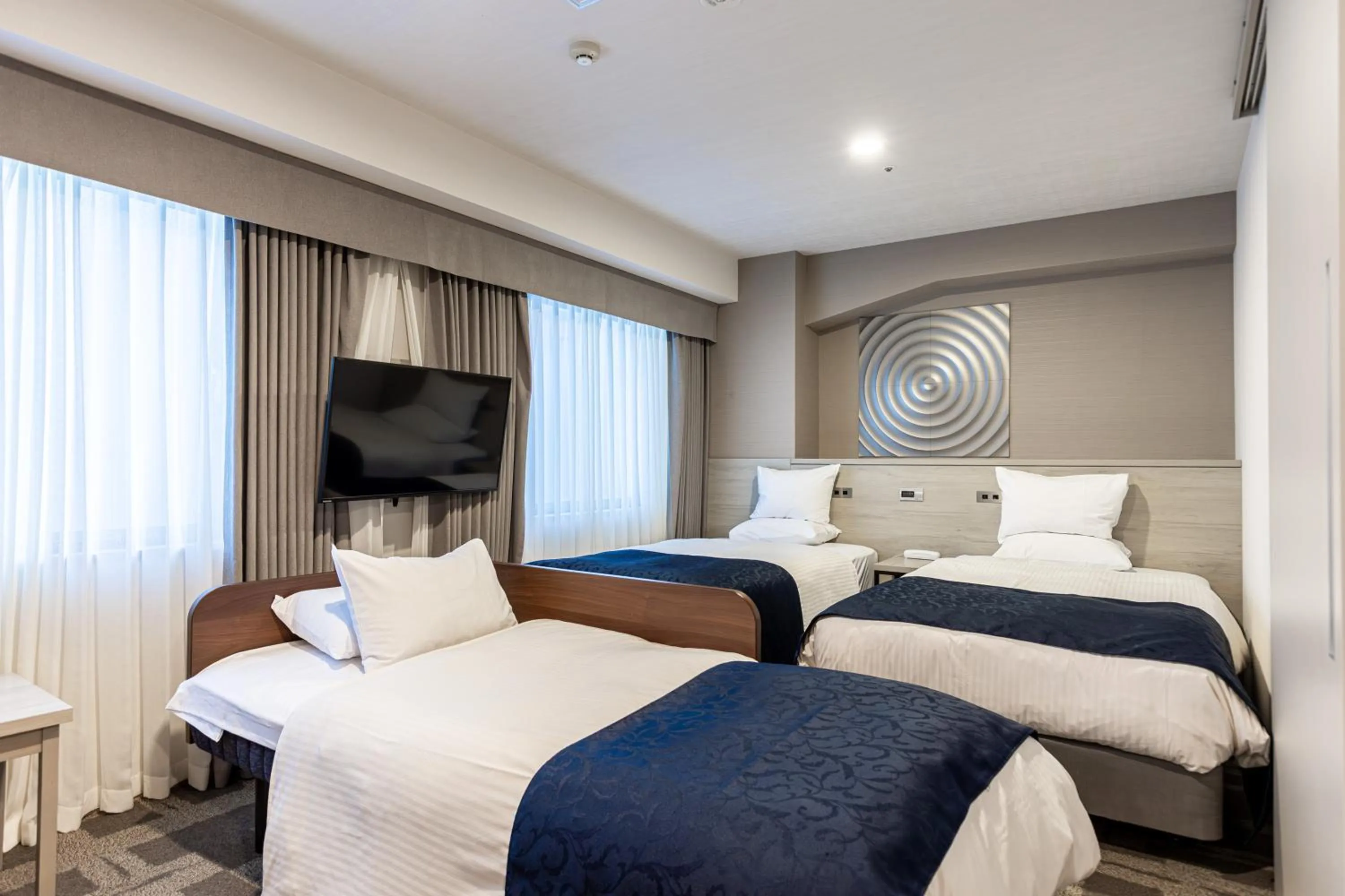 Bed in Hotel Rose Garden Shinjuku