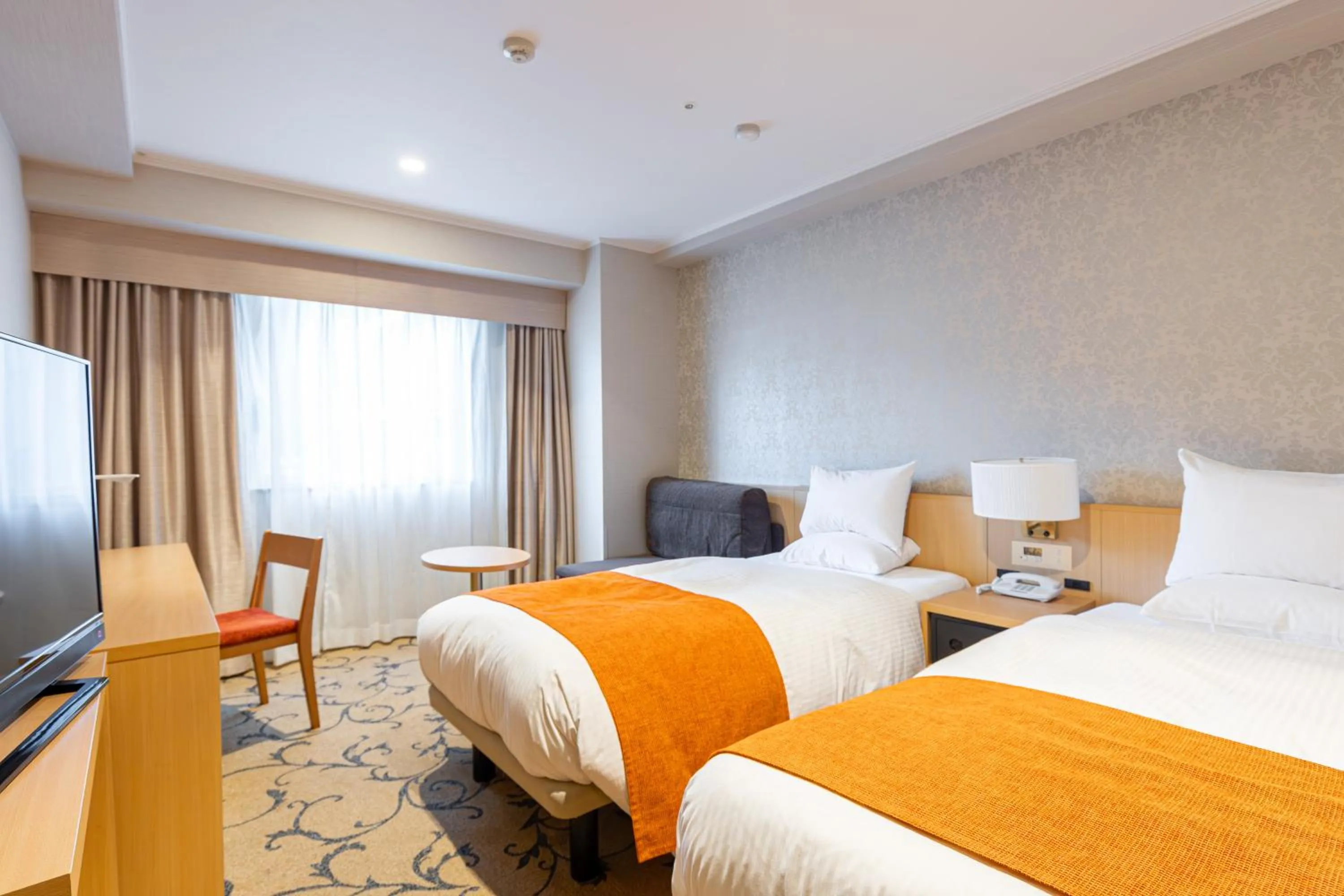 Bed in Hotel Rose Garden Shinjuku