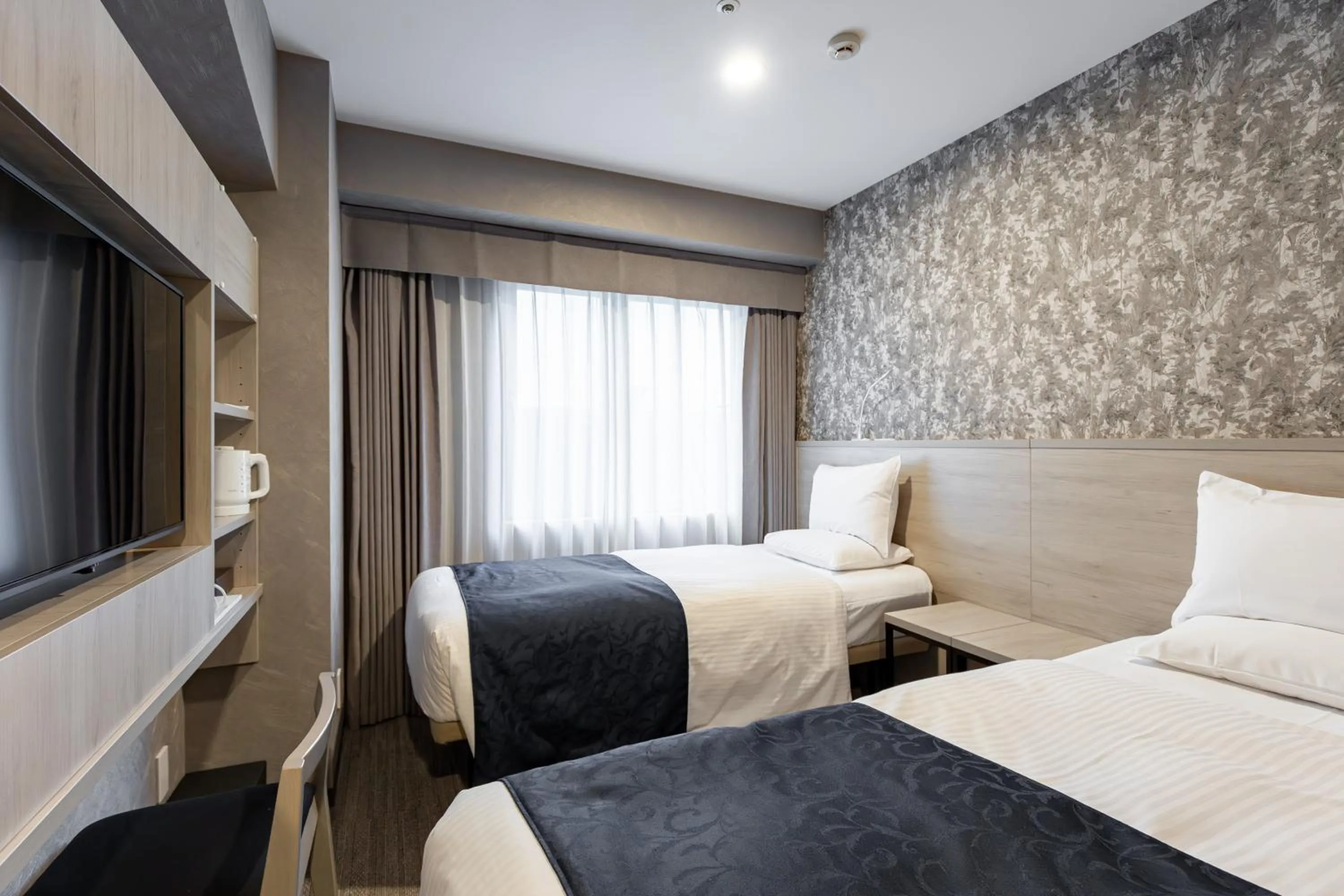 Bed in Hotel Rose Garden Shinjuku