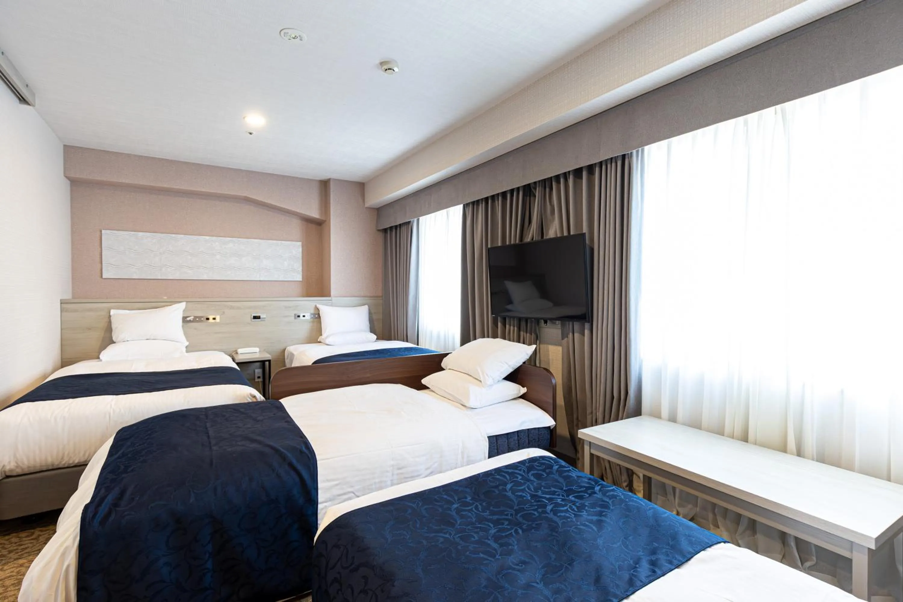 Bed in Hotel Rose Garden Shinjuku