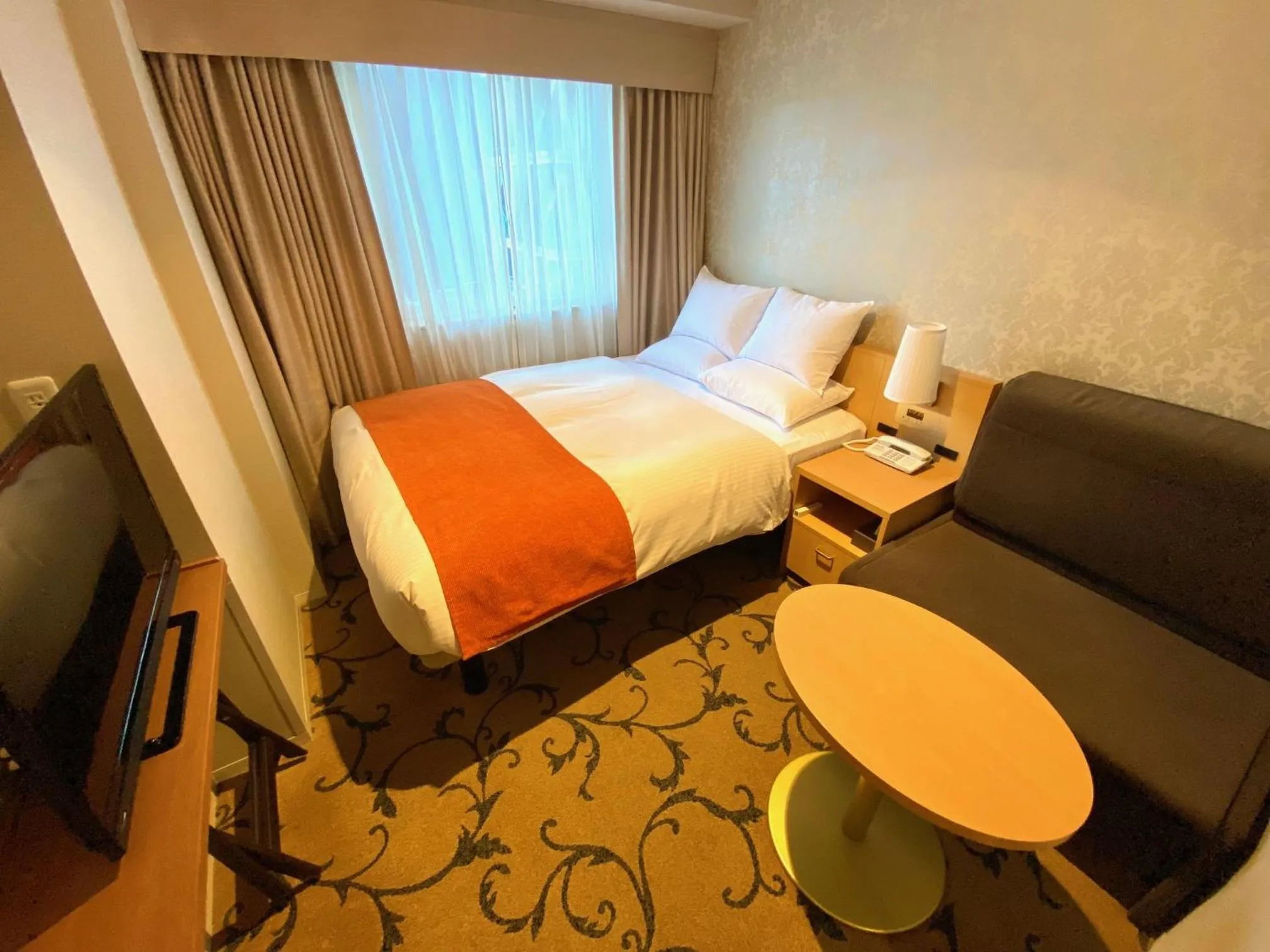 Bed in Hotel Rose Garden Shinjuku