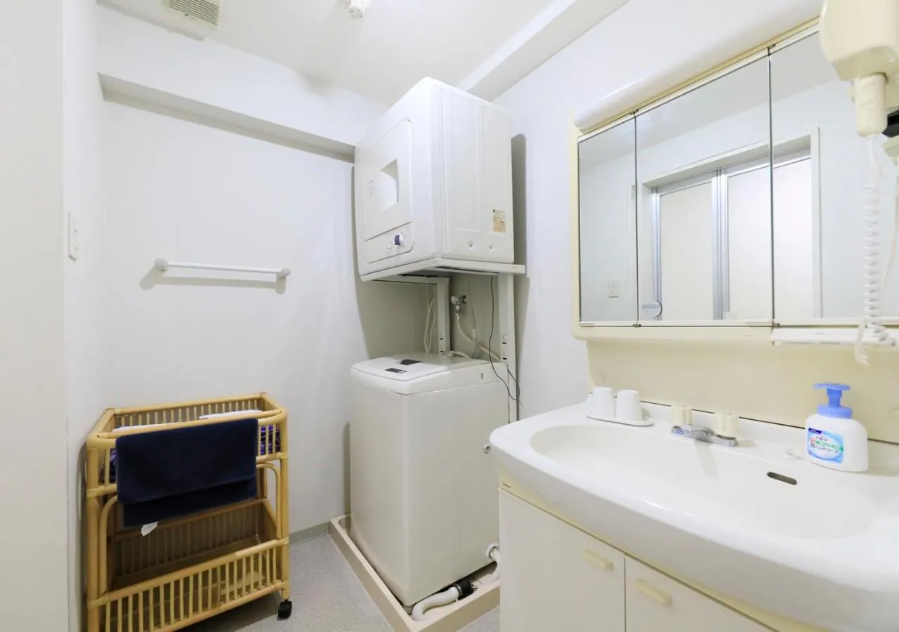 washing machine in Katsuura Hilltop Hotel & Residence