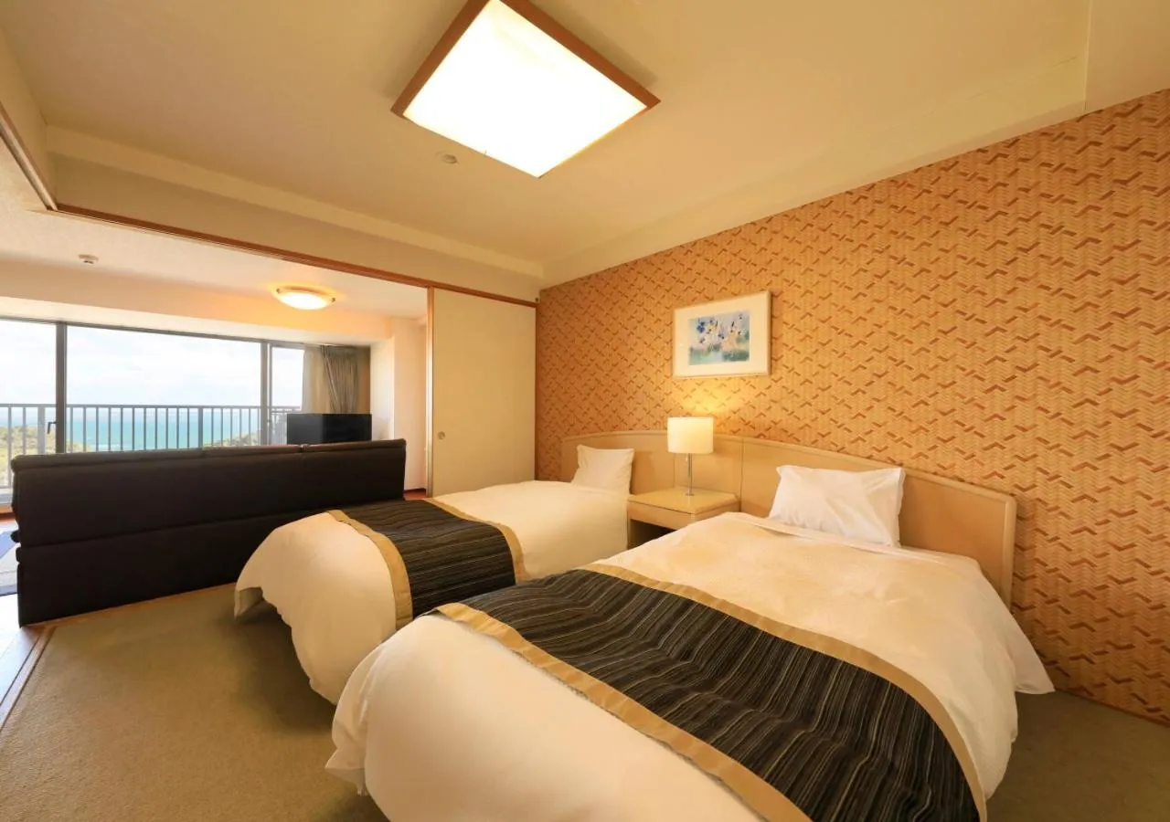 Photo of the whole room, Bed in Katsuura Hilltop Hotel & Residence