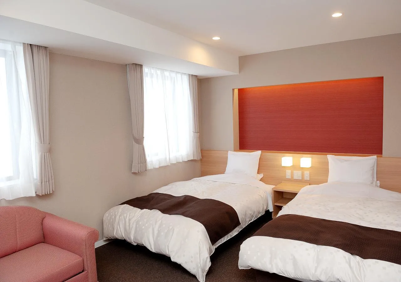 Bed in Shibetsu Grand Hotel