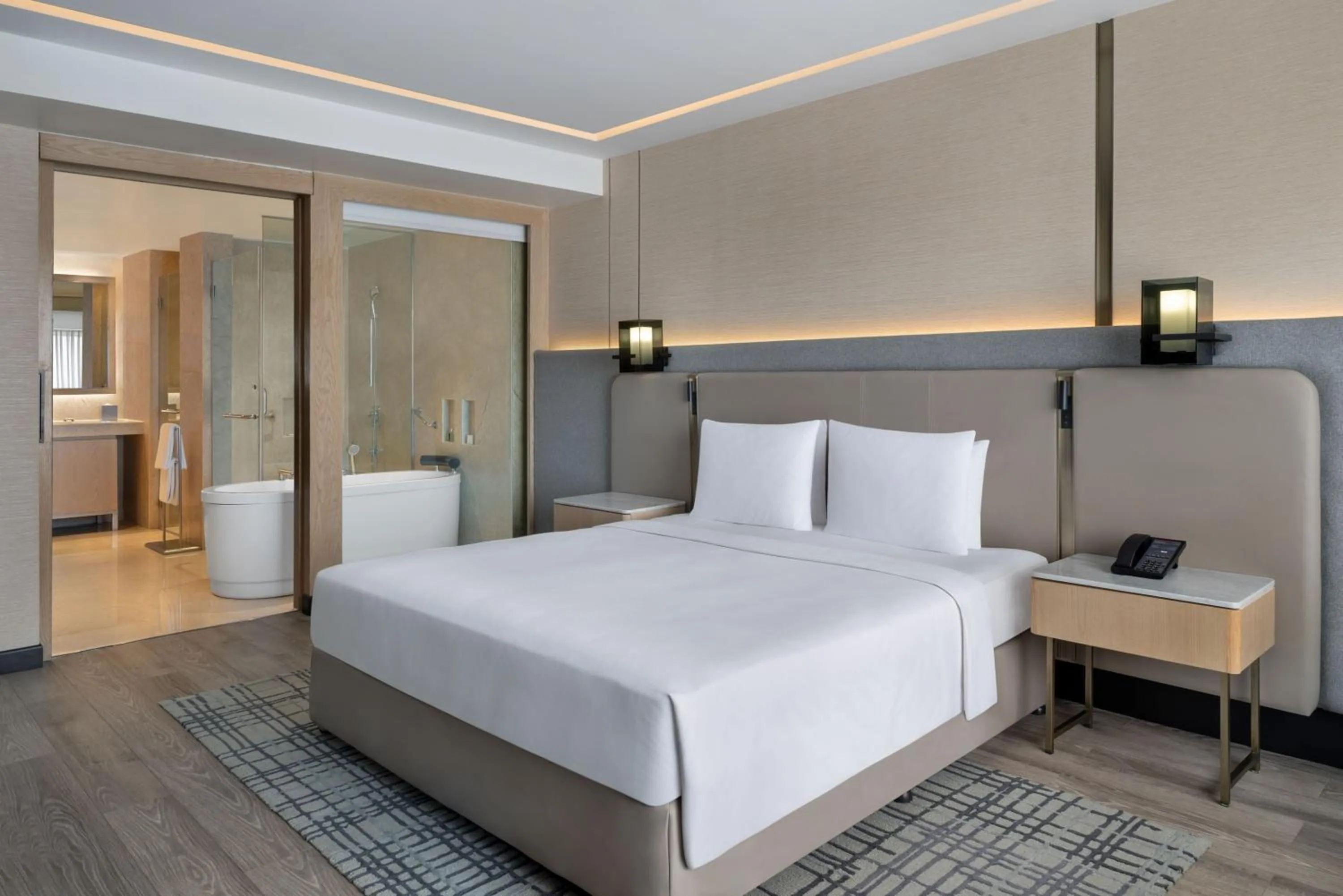 Bed in Courtyard by Marriott Mumbai International Airport