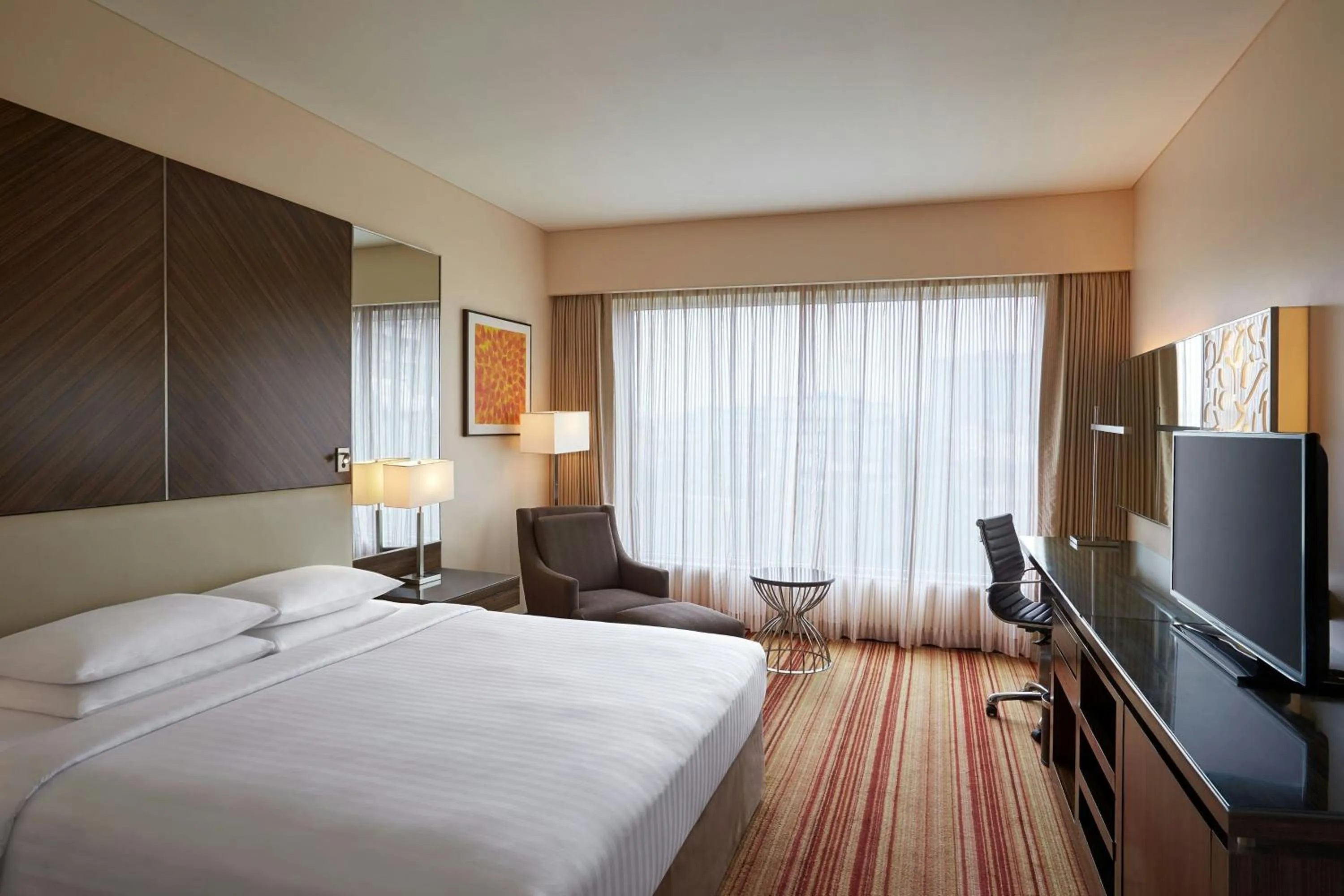 Photo of the whole room, Bed in Courtyard by Marriott Mumbai International Airport