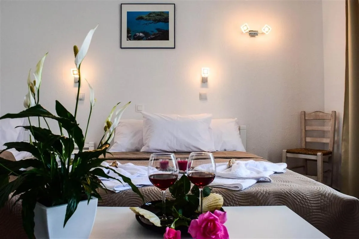 Bed in Astri Hotel