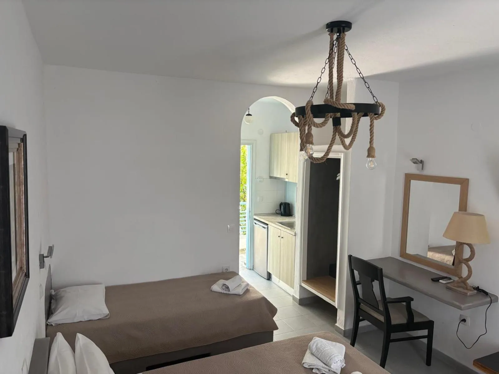 Bed in Astri Hotel