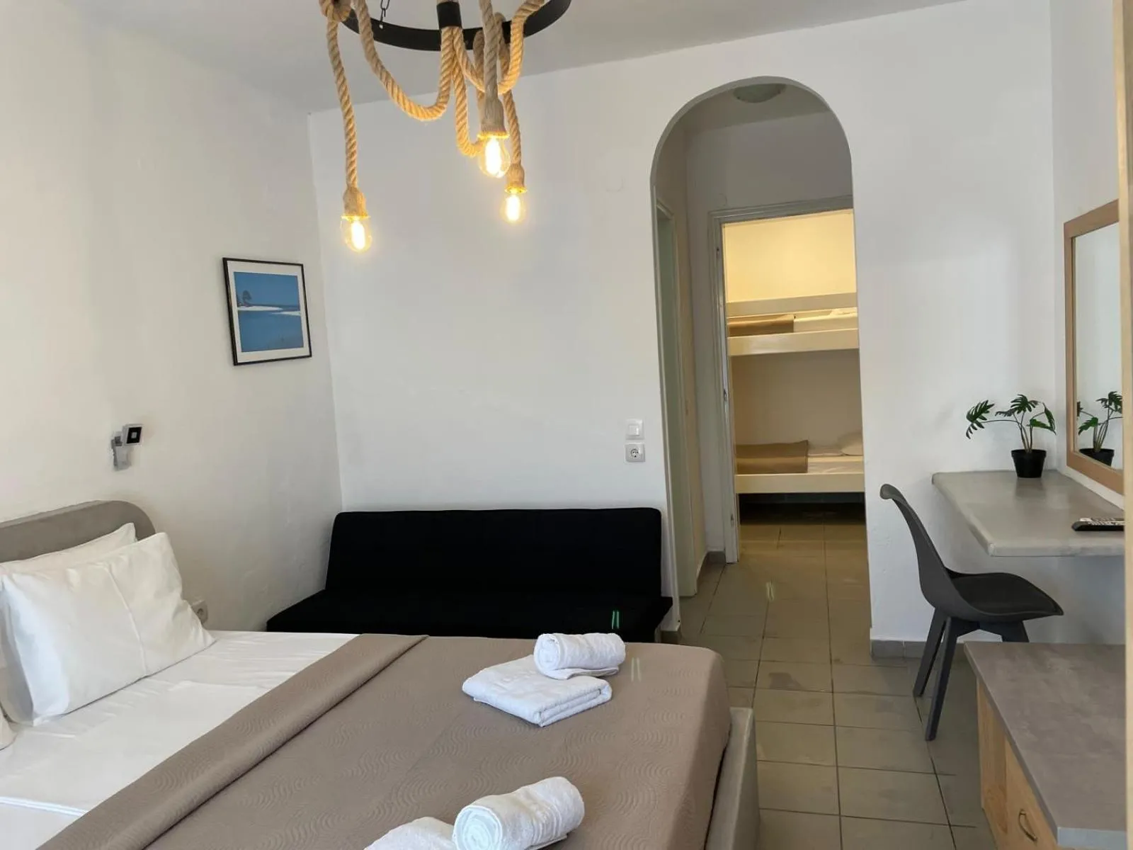 Bed in Astri Hotel