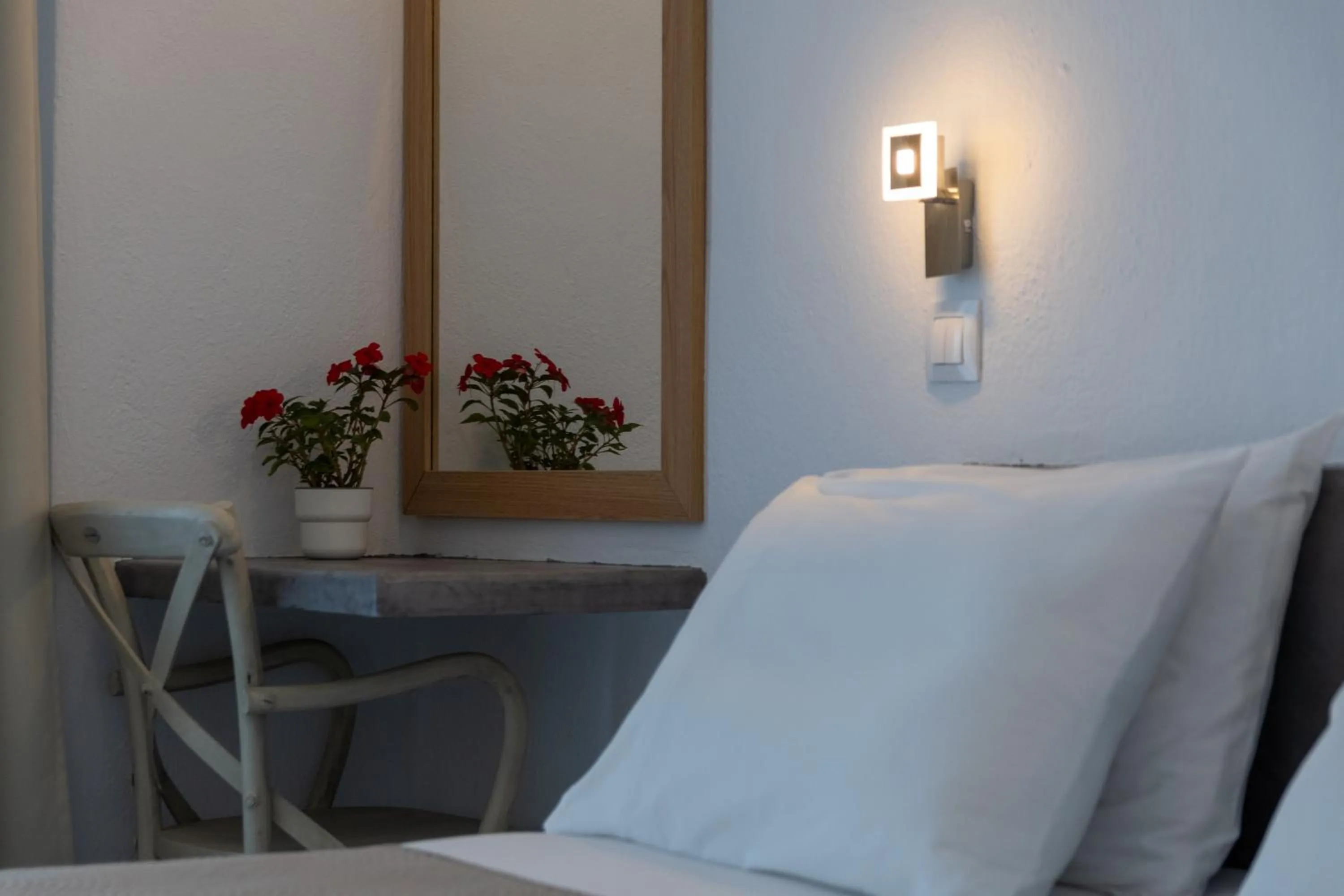Bed in Astri Hotel