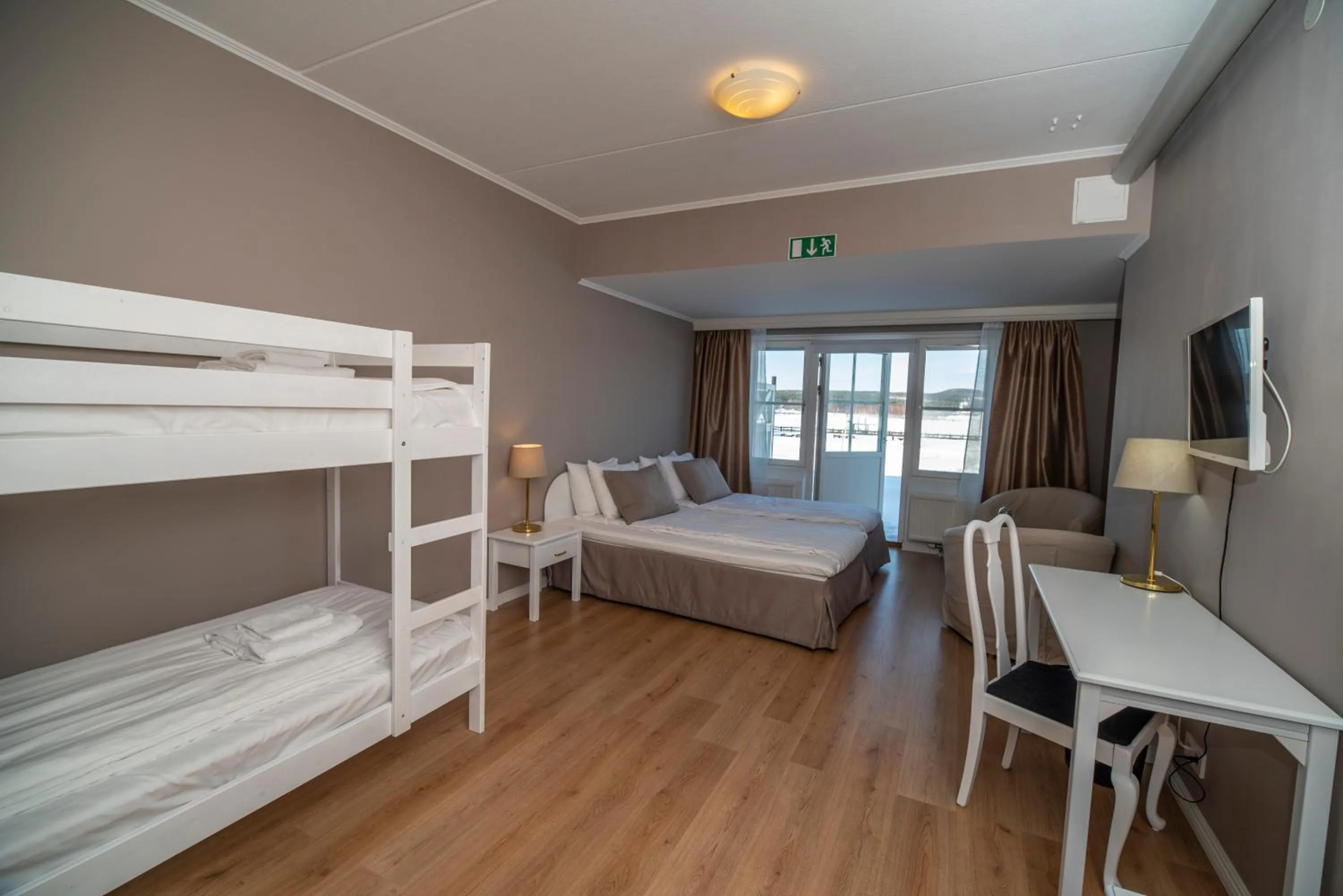 Bed in Grand Arctic Resort