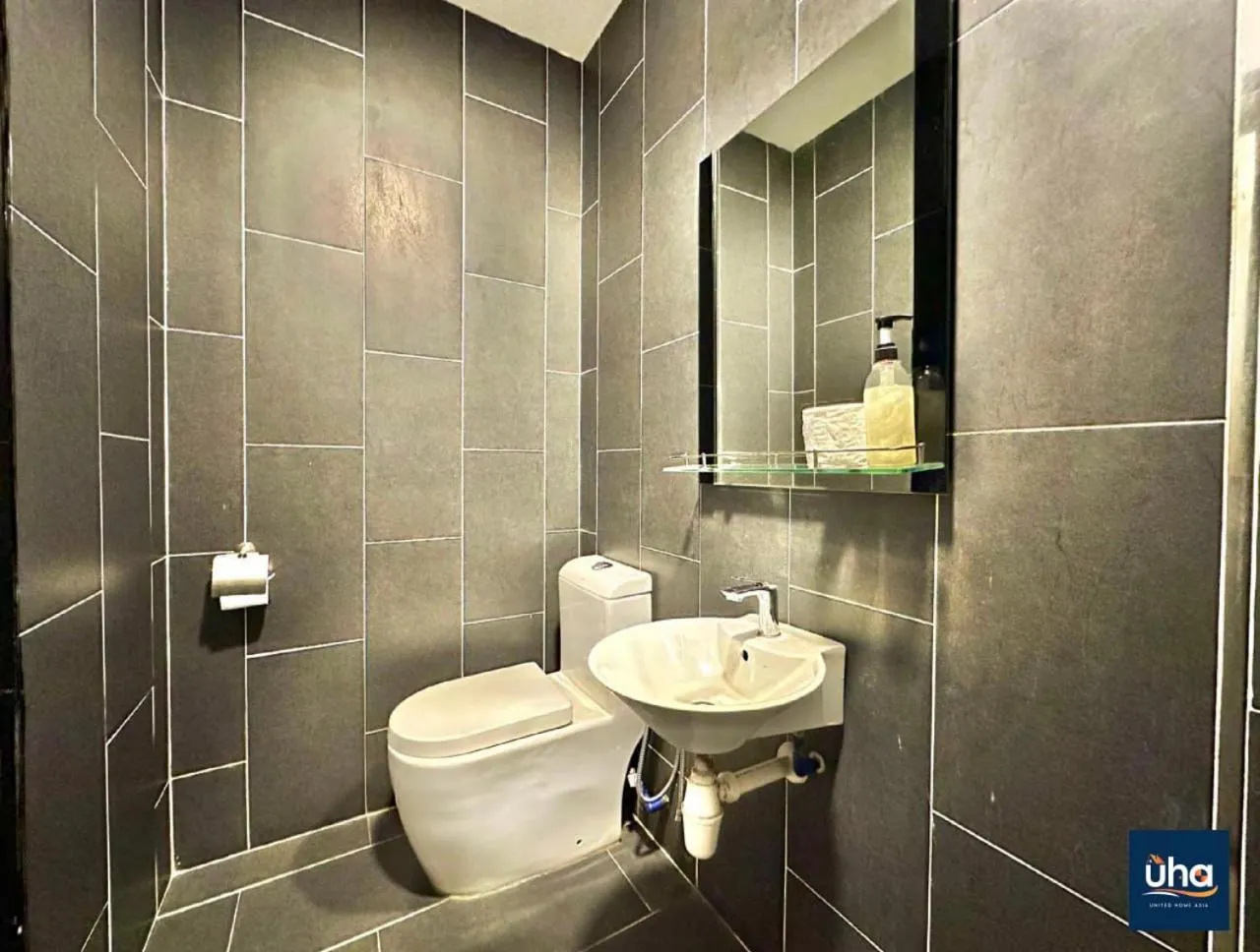 Shower in Cube 8 Teens Taman Mount Austin Apartment by UHA