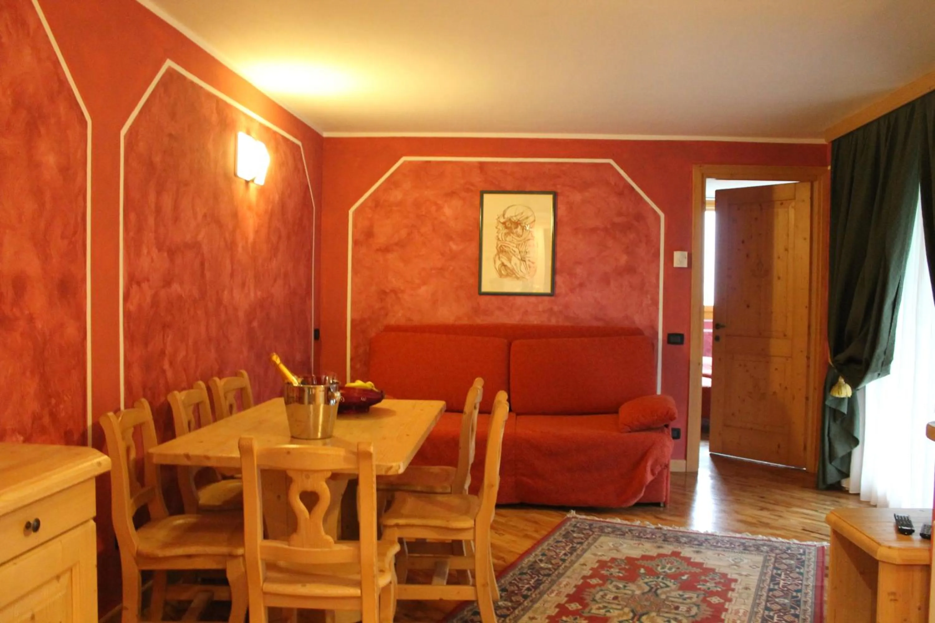 Dining area in Boscone Suite Hotel