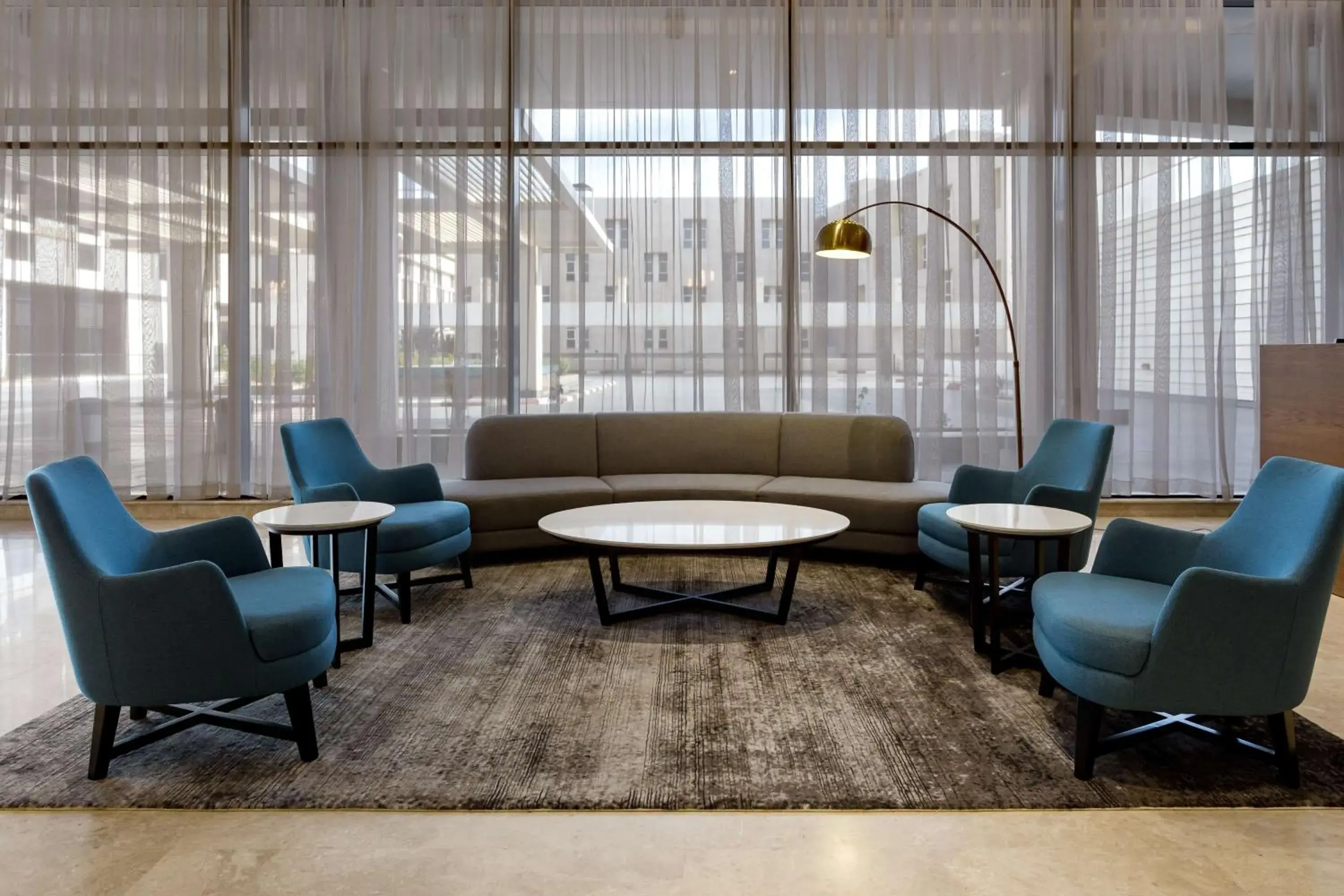 Lobby or reception in Radisson Hotel & Apartments Dammam Industrial City Lobby or reception in Radisson Hotel & Apartments Dammam Industrial City