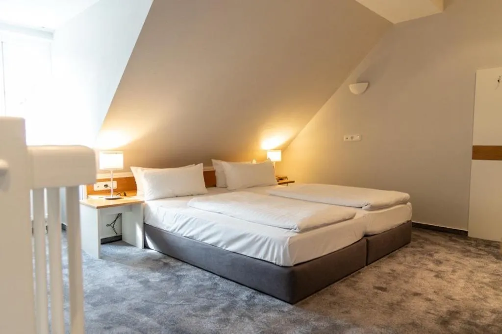 Bedroom, Bed in Schiefer Suite Hotel & Apartments