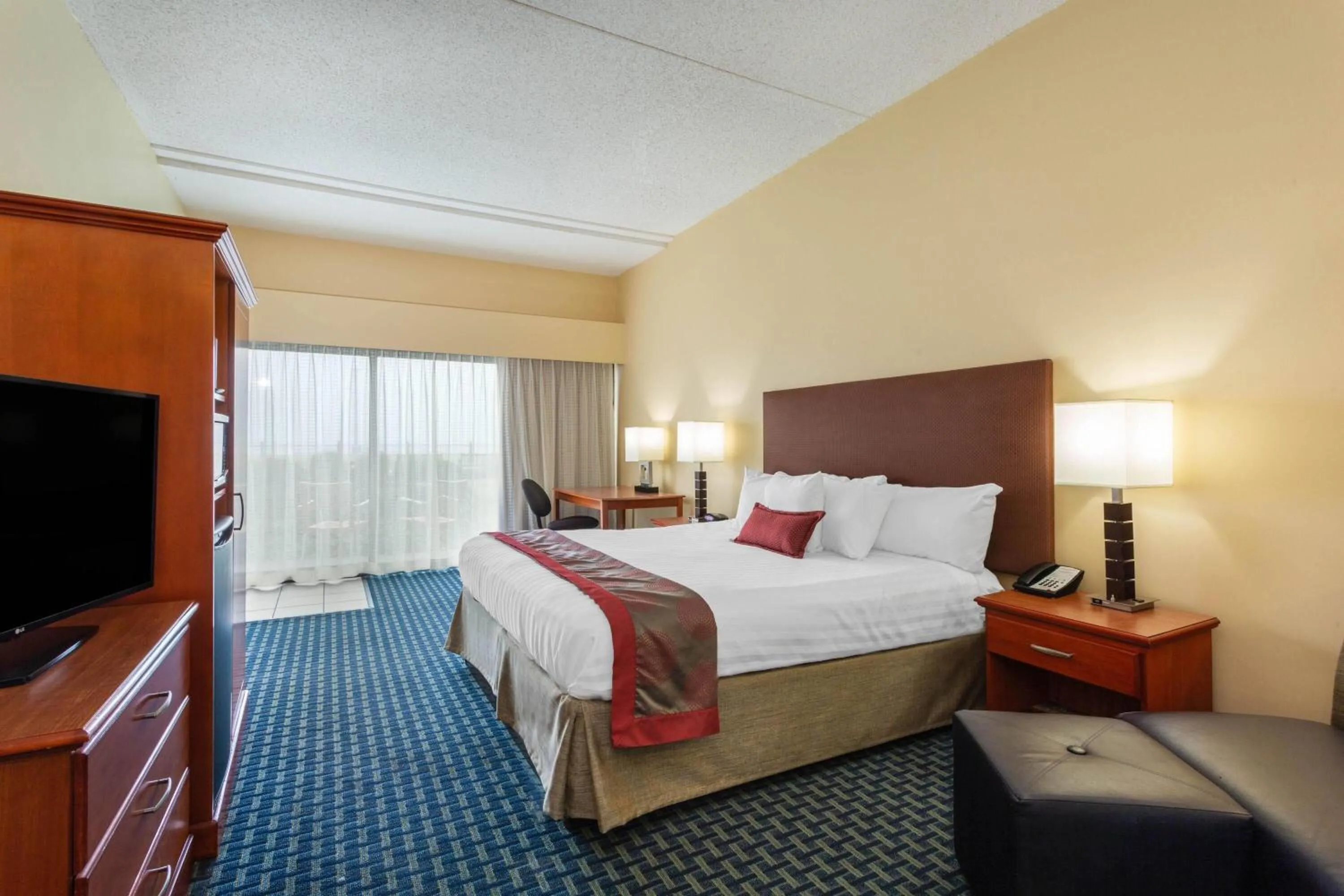 Photo of the whole room, Bed in Ramada Plaza by Wyndham Virginia Beach Oceanfront