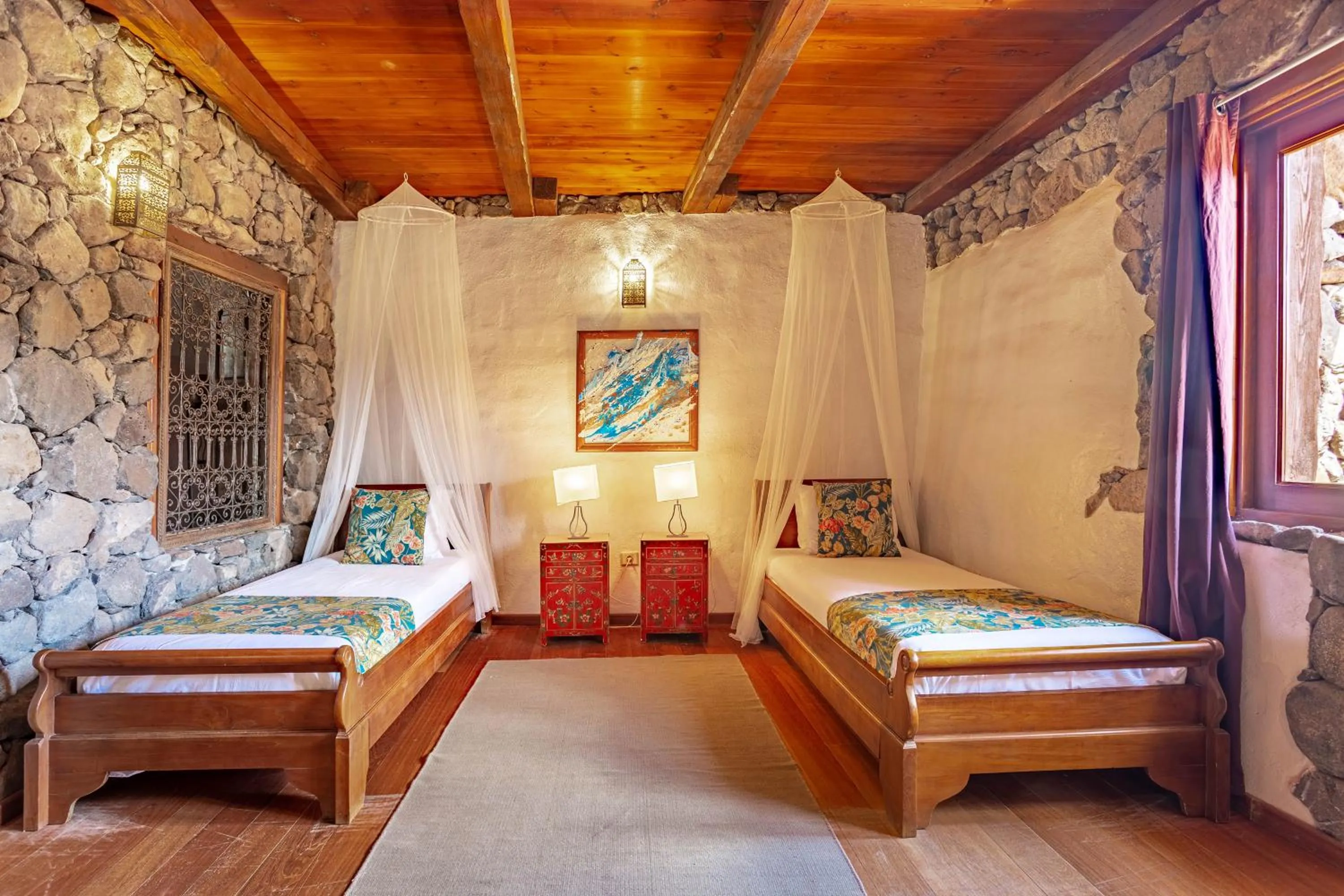 Bedroom, Bed in Finca De Arrieta Village - Yurts and Stone Cottages - Shared Pool - Walking distance to Arrieta Beach - Off Grid