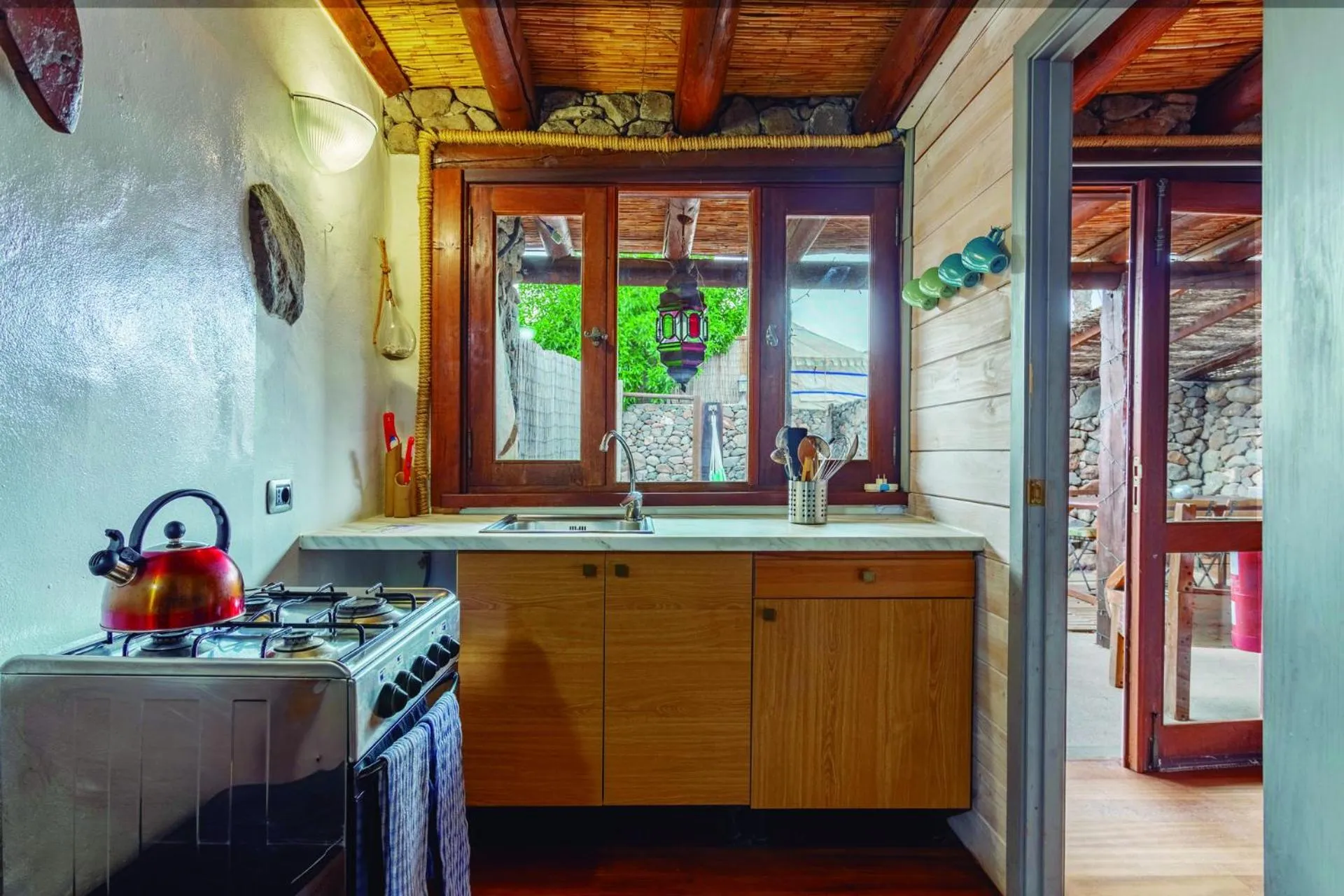 kitchen in Finca De Arrieta Village - Yurts and Stone Cottages - Shared Pool - Walking distance to Arrieta Beach - Off Grid