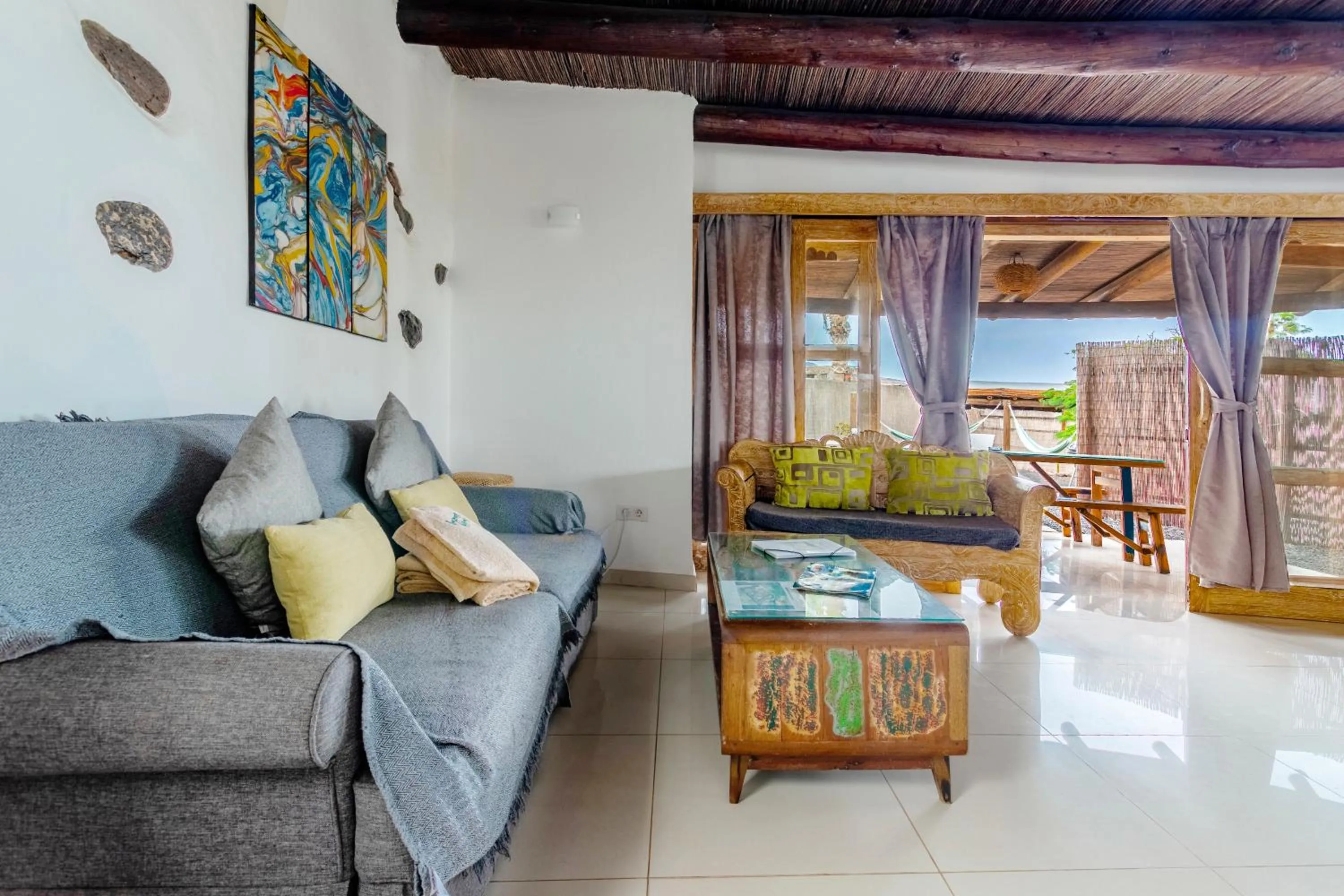 Living room in Finca De Arrieta Village - Yurts and Stone Cottages - Shared Pool - Walking distance to Arrieta Beach - Off Grid