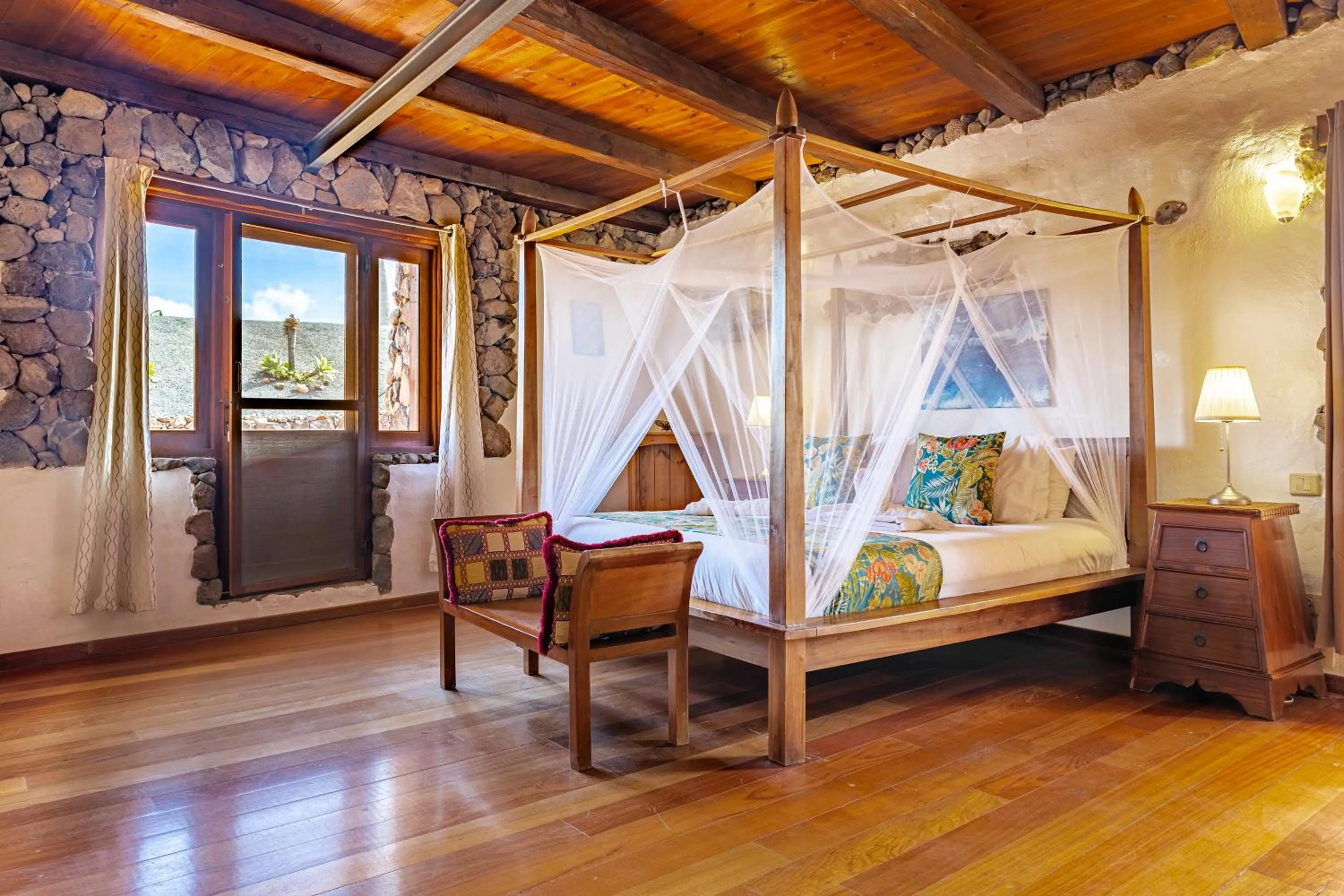 Bedroom, Bed in Finca De Arrieta Village - Yurts and Stone Cottages - Shared Pool - Walking distance to Arrieta Beach - Off Grid