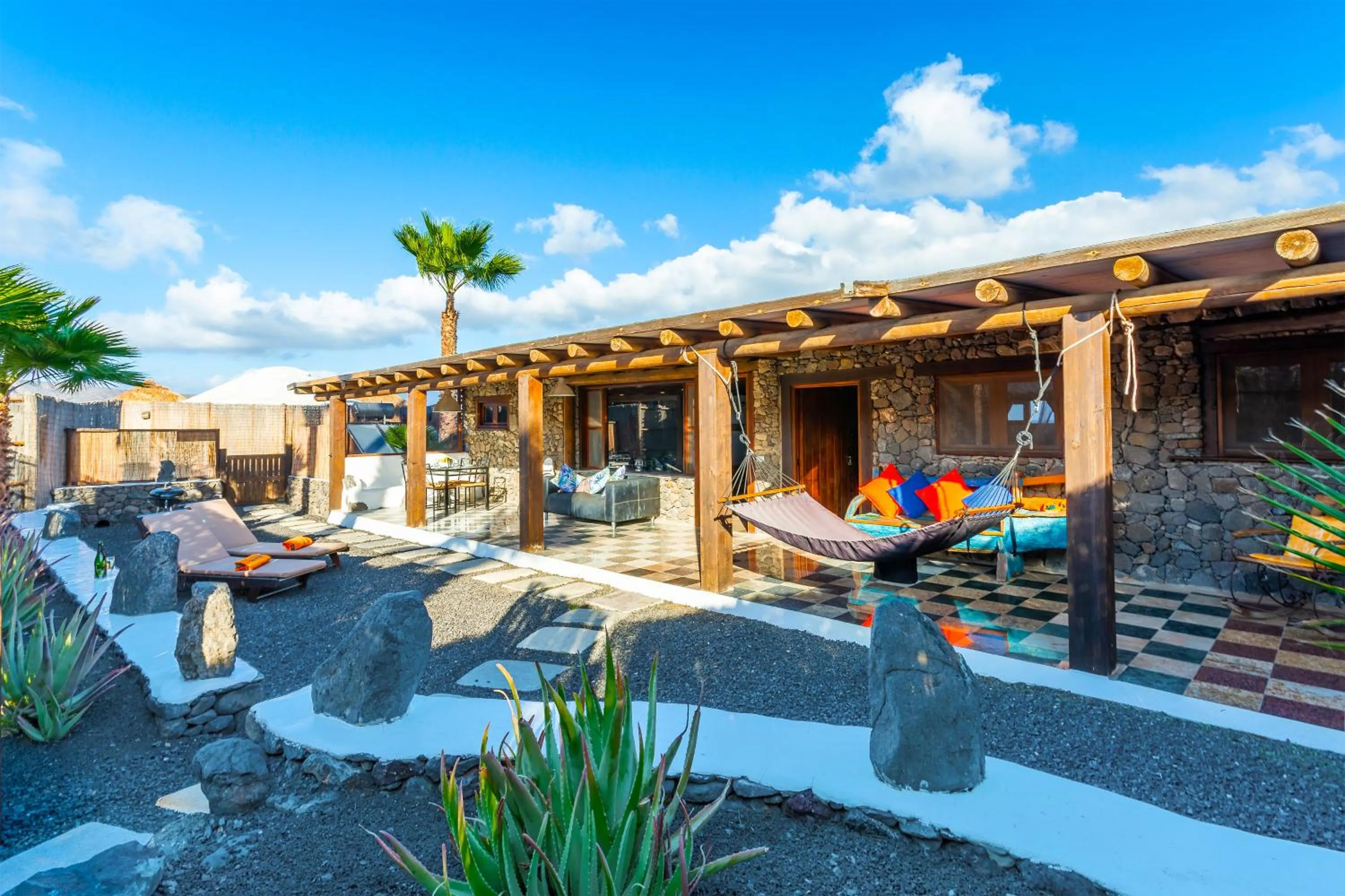 Patio in Finca De Arrieta Village - Yurts and Stone Cottages - Shared Pool - Walking distance to Arrieta Beach - Off Grid