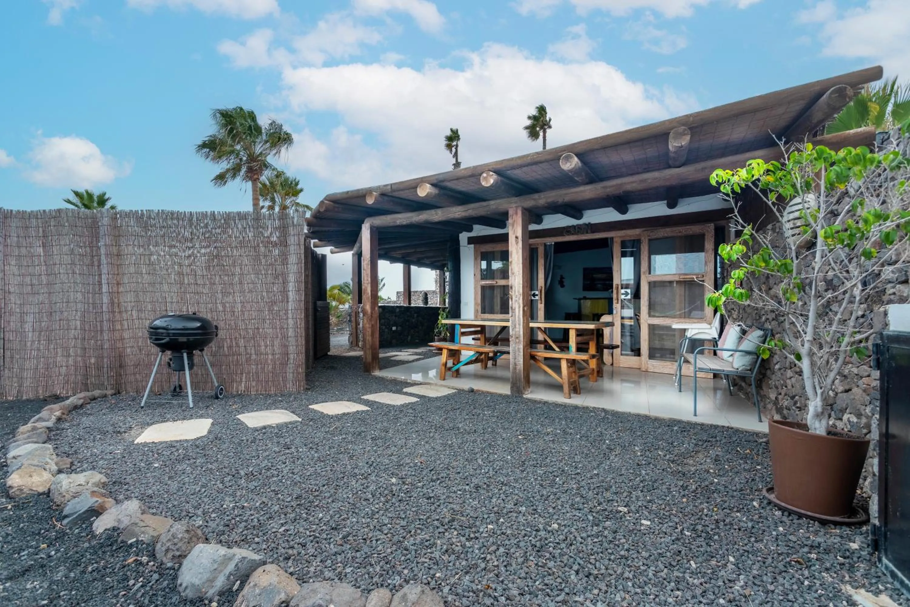 Patio in Finca De Arrieta Village - Yurts and Stone Cottages - Shared Pool - Walking distance to Arrieta Beach - Off Grid