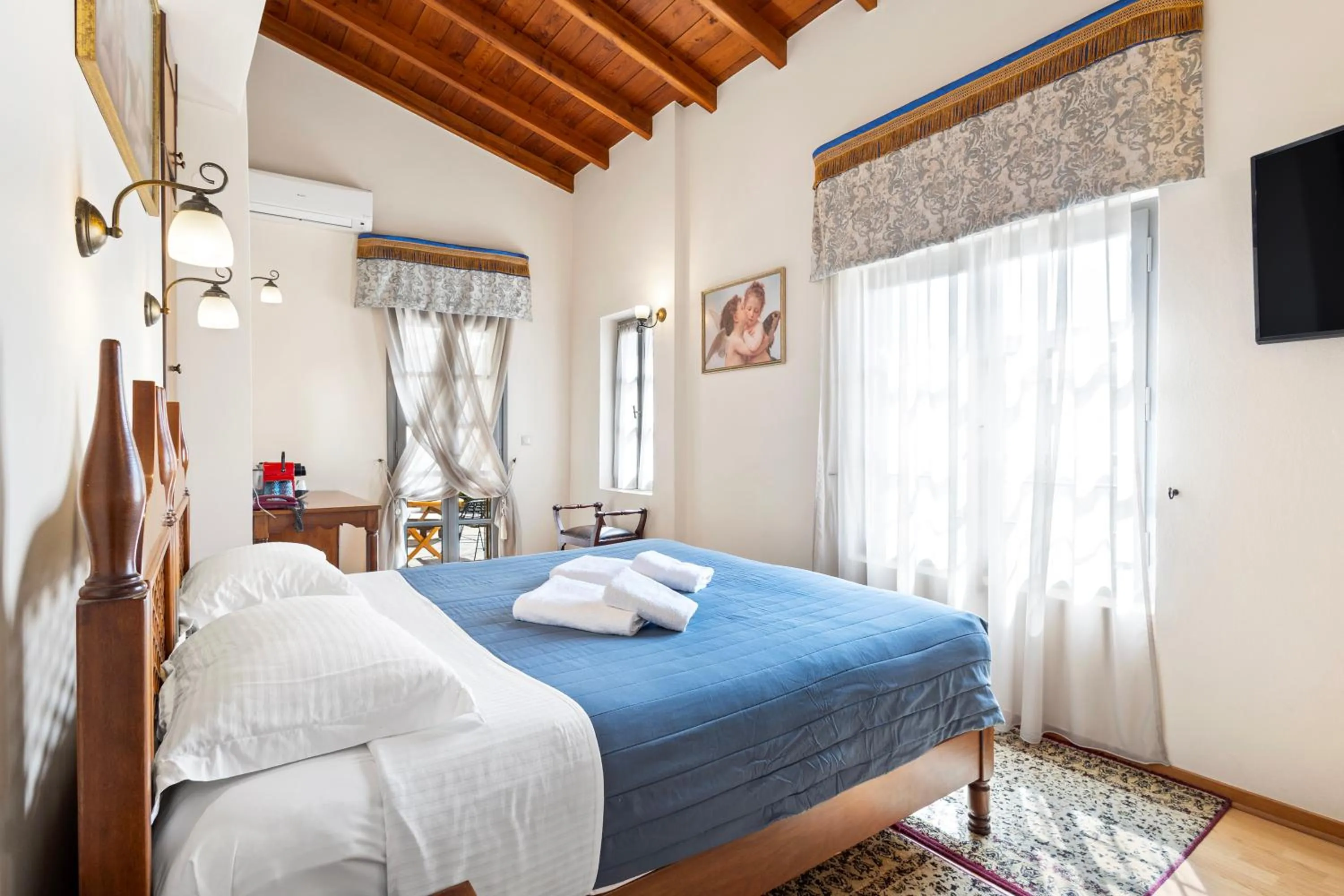 Bed in Belmondo Hotel