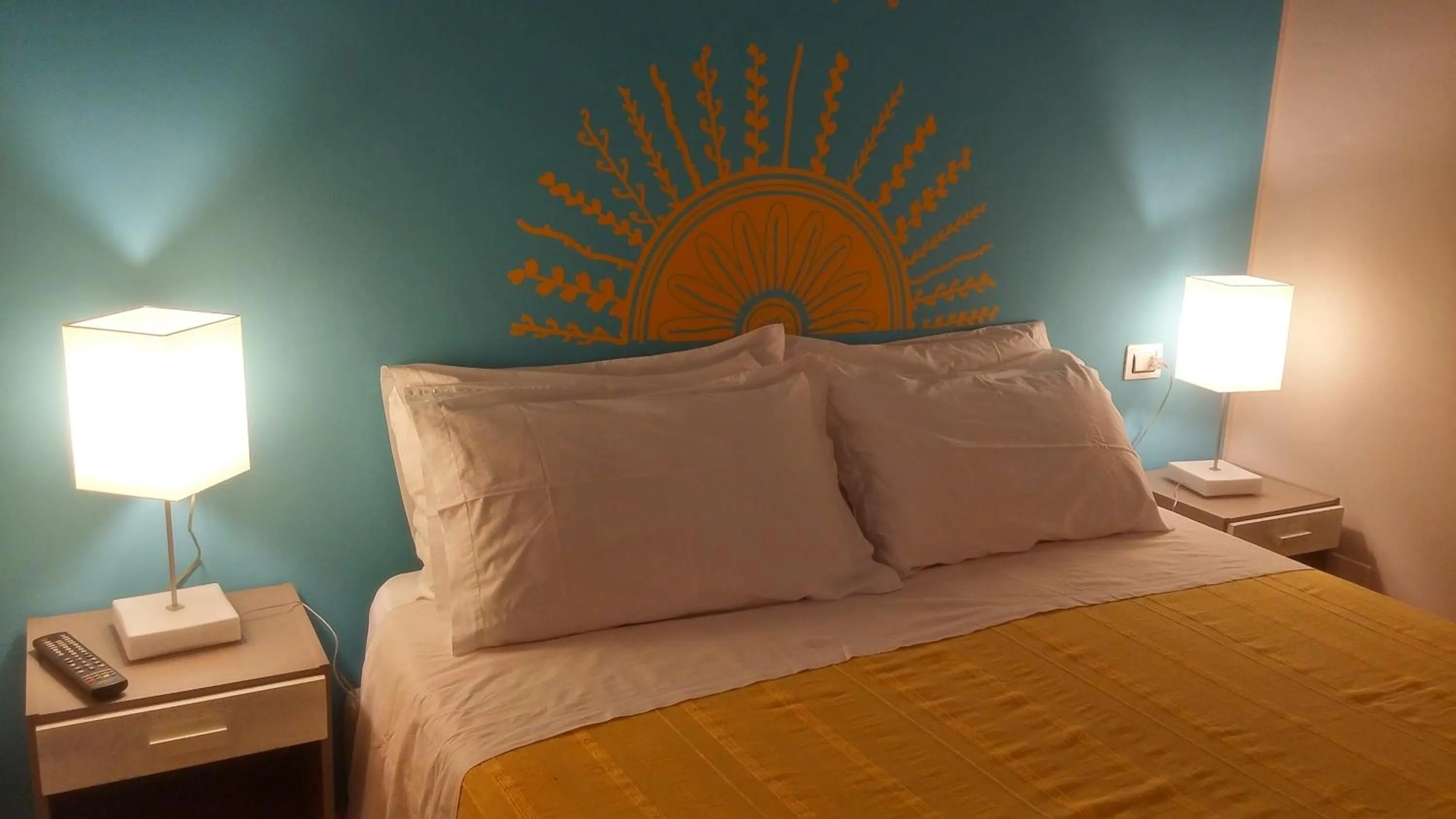 Photo of the whole room, Bed in La Casa del Melograno