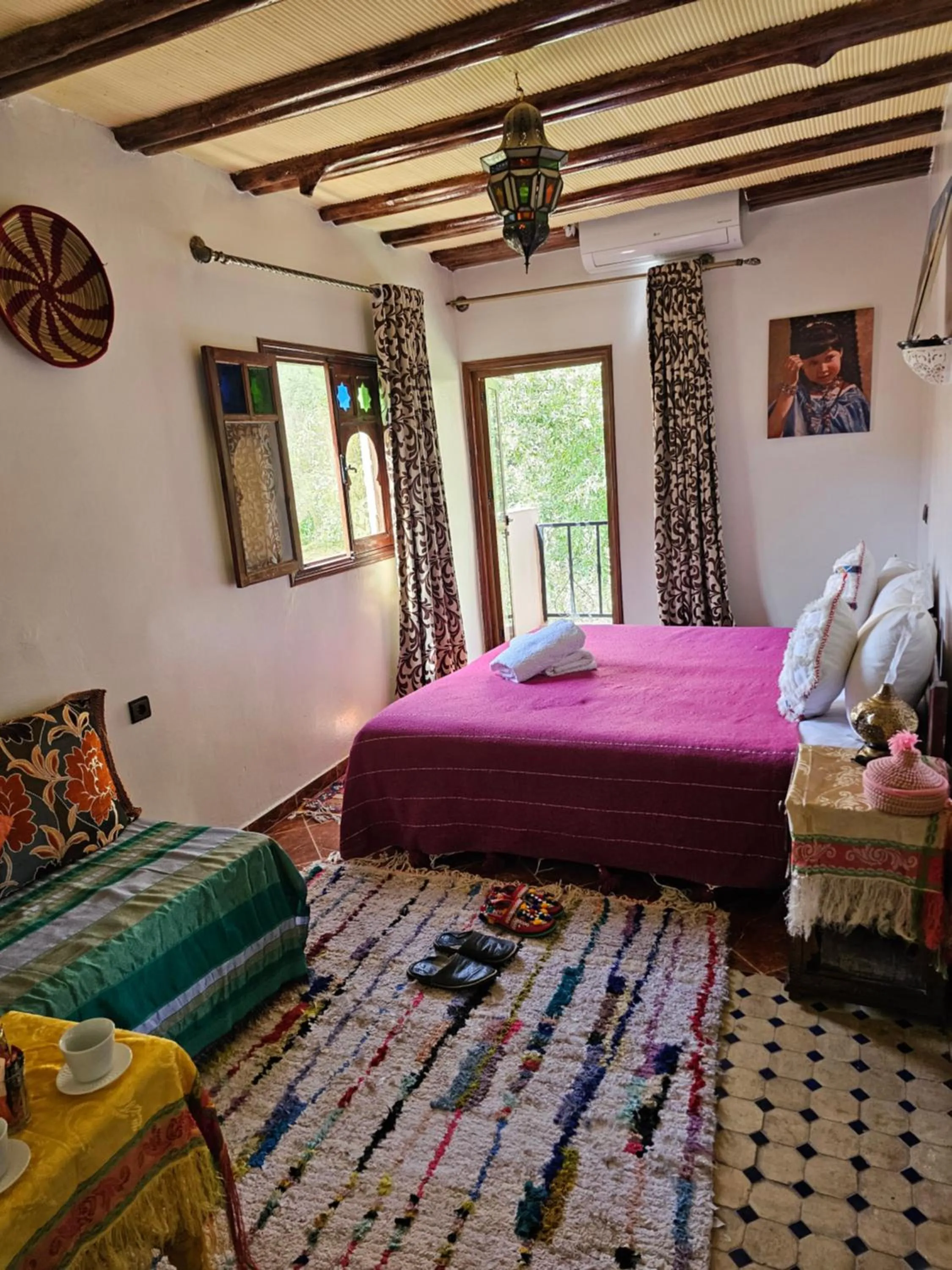 Bed in Riad Oussagou