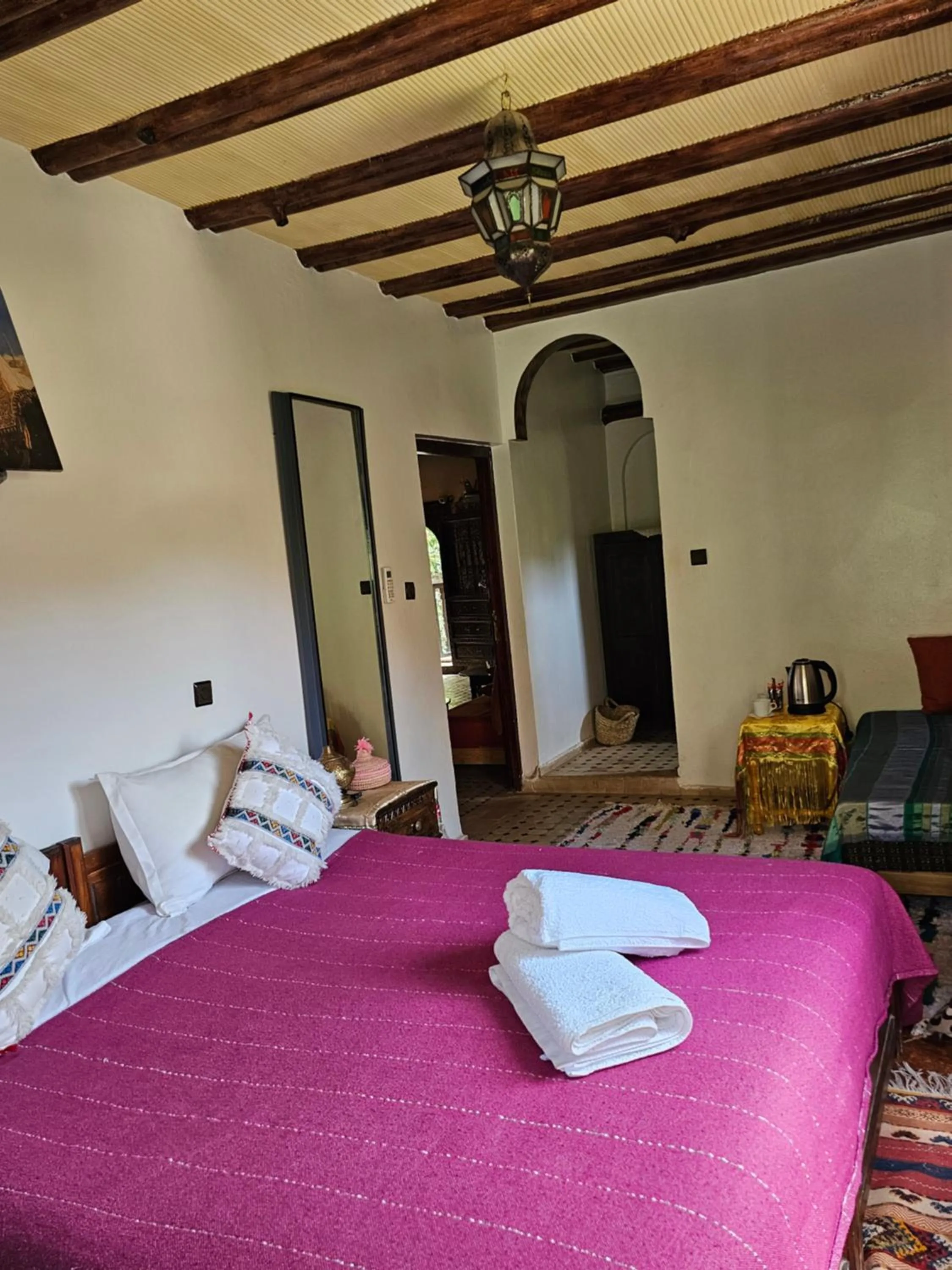 Bed in Riad Oussagou