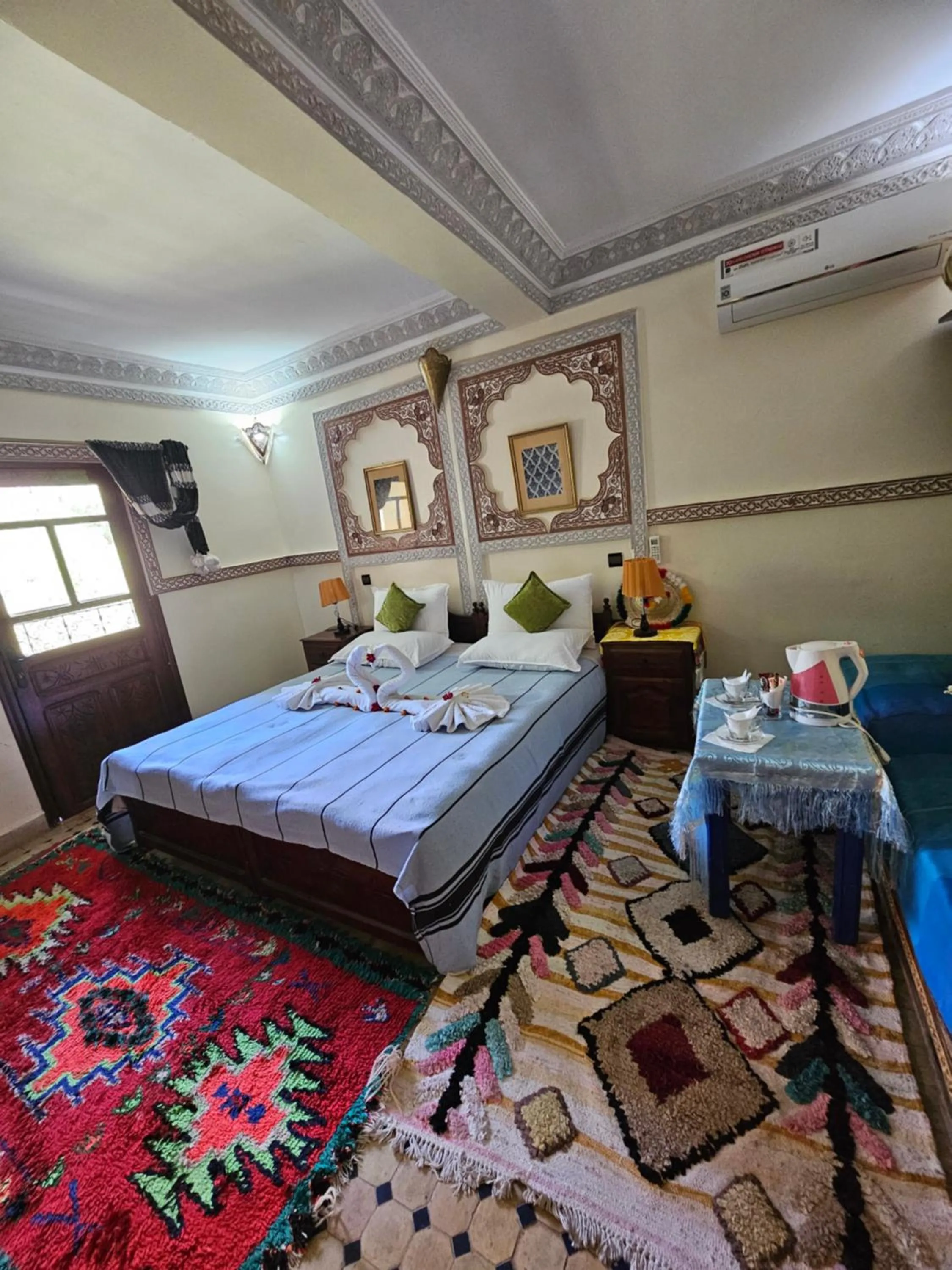Bed in Riad Oussagou