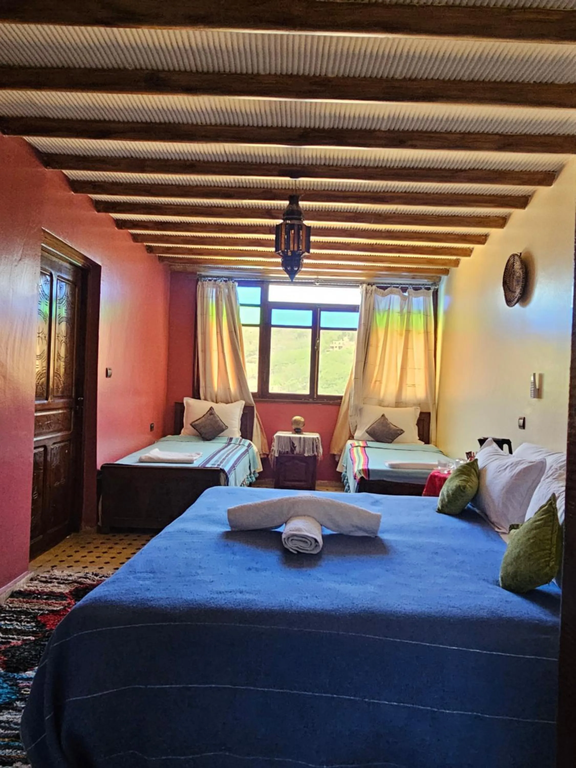 Garden view, Bed in Riad Oussagou
