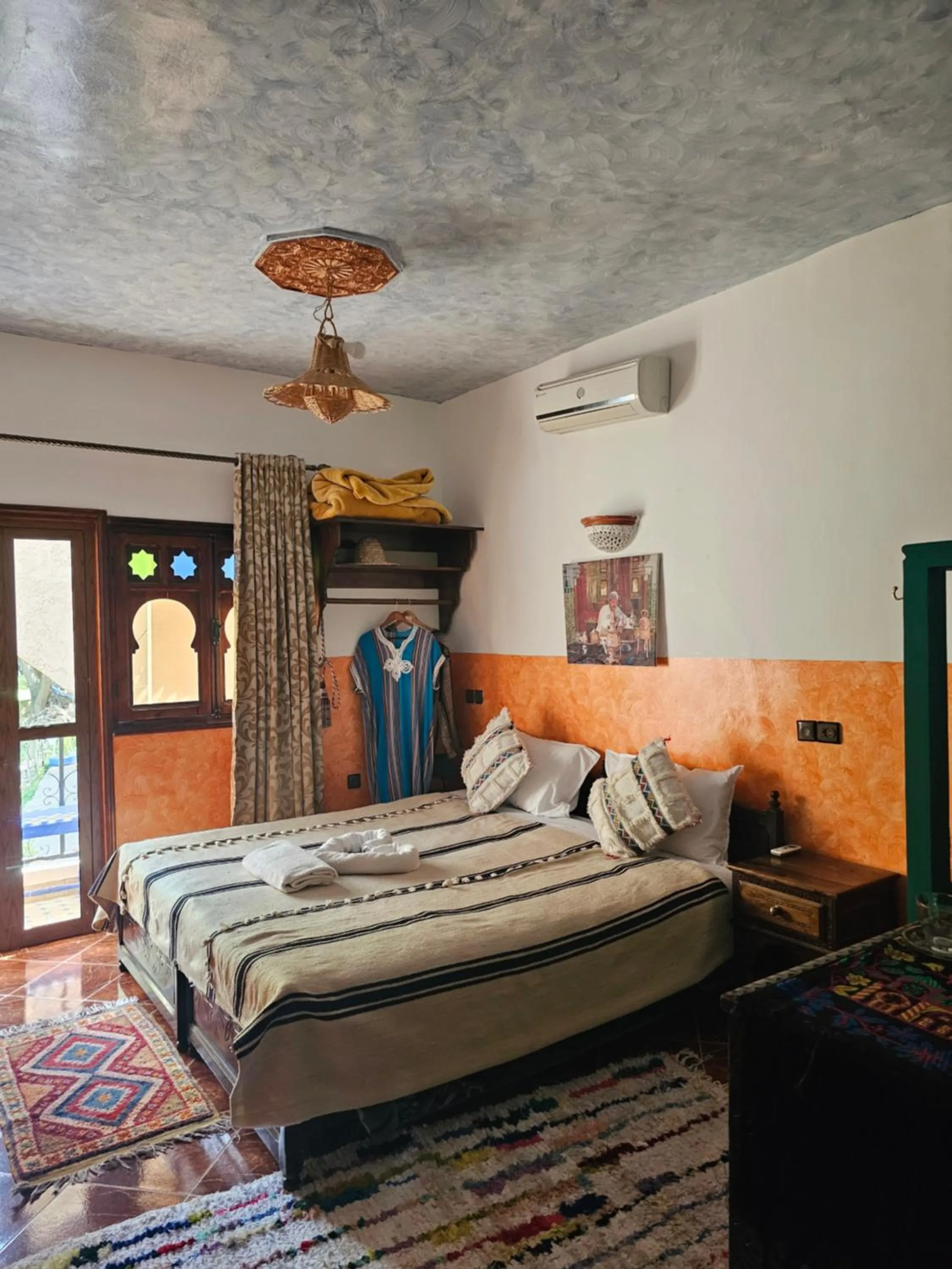 Bed in Riad Oussagou