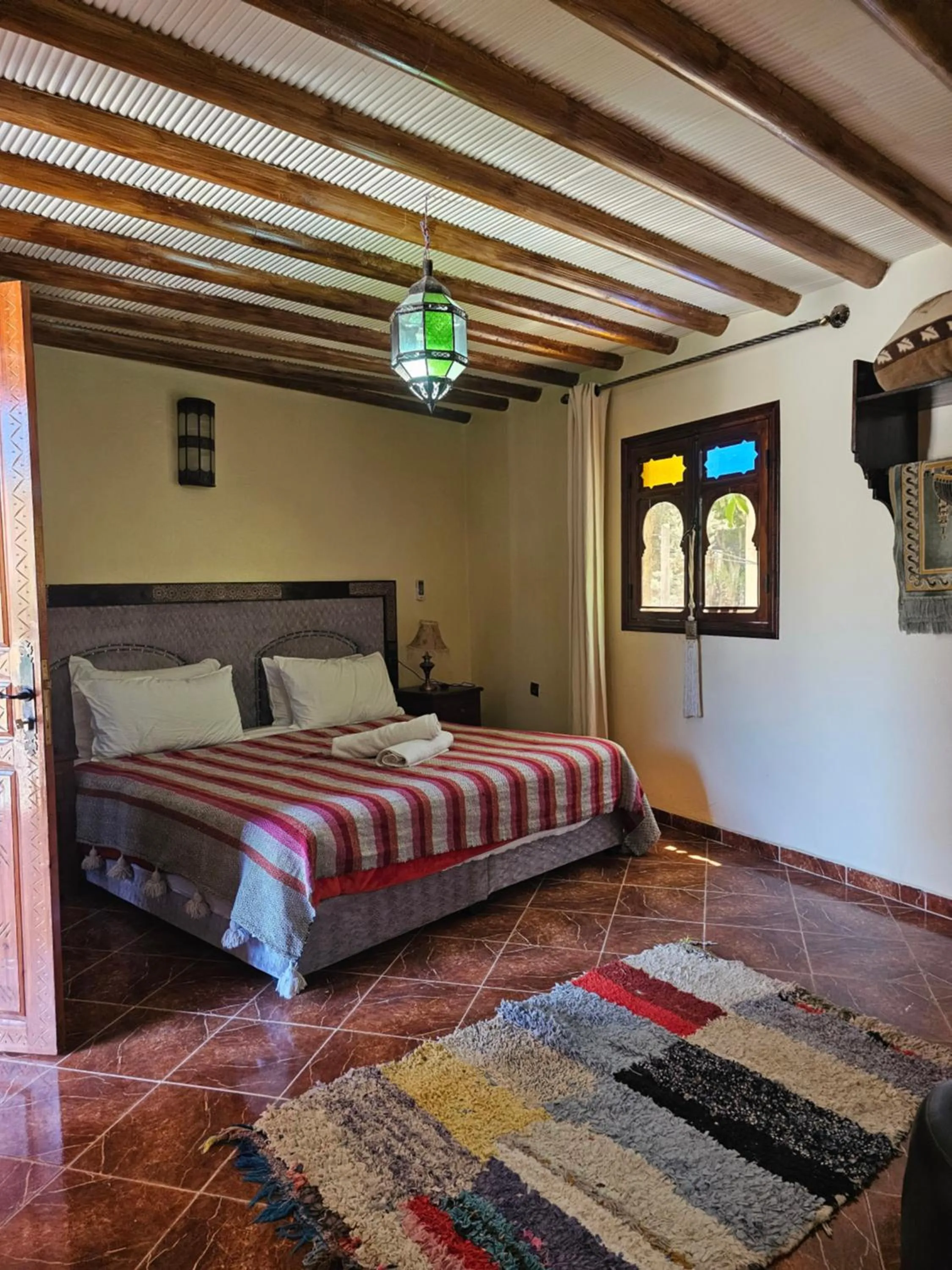 Shower, Bed in Riad Oussagou
