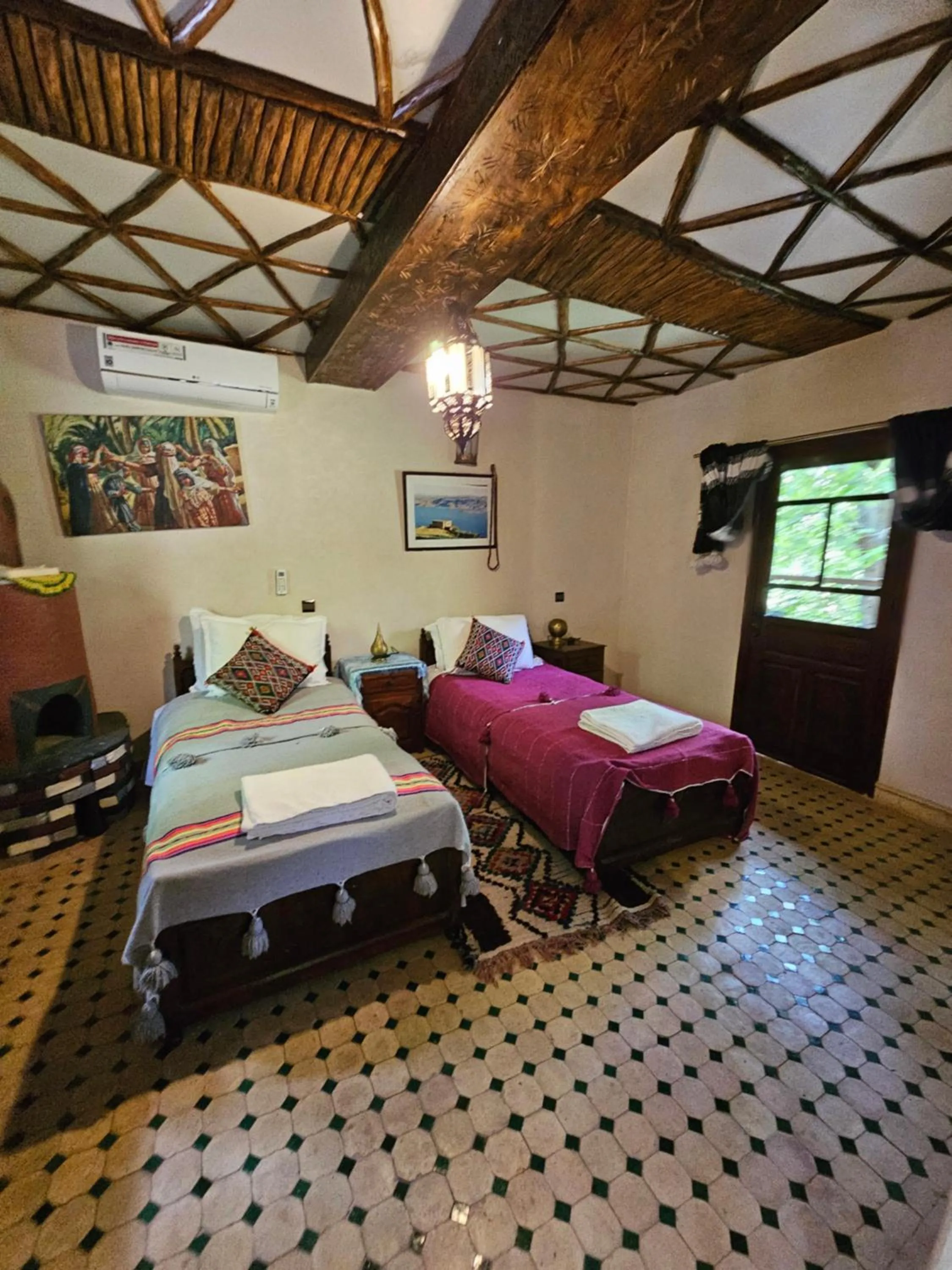 Bed in Riad Oussagou