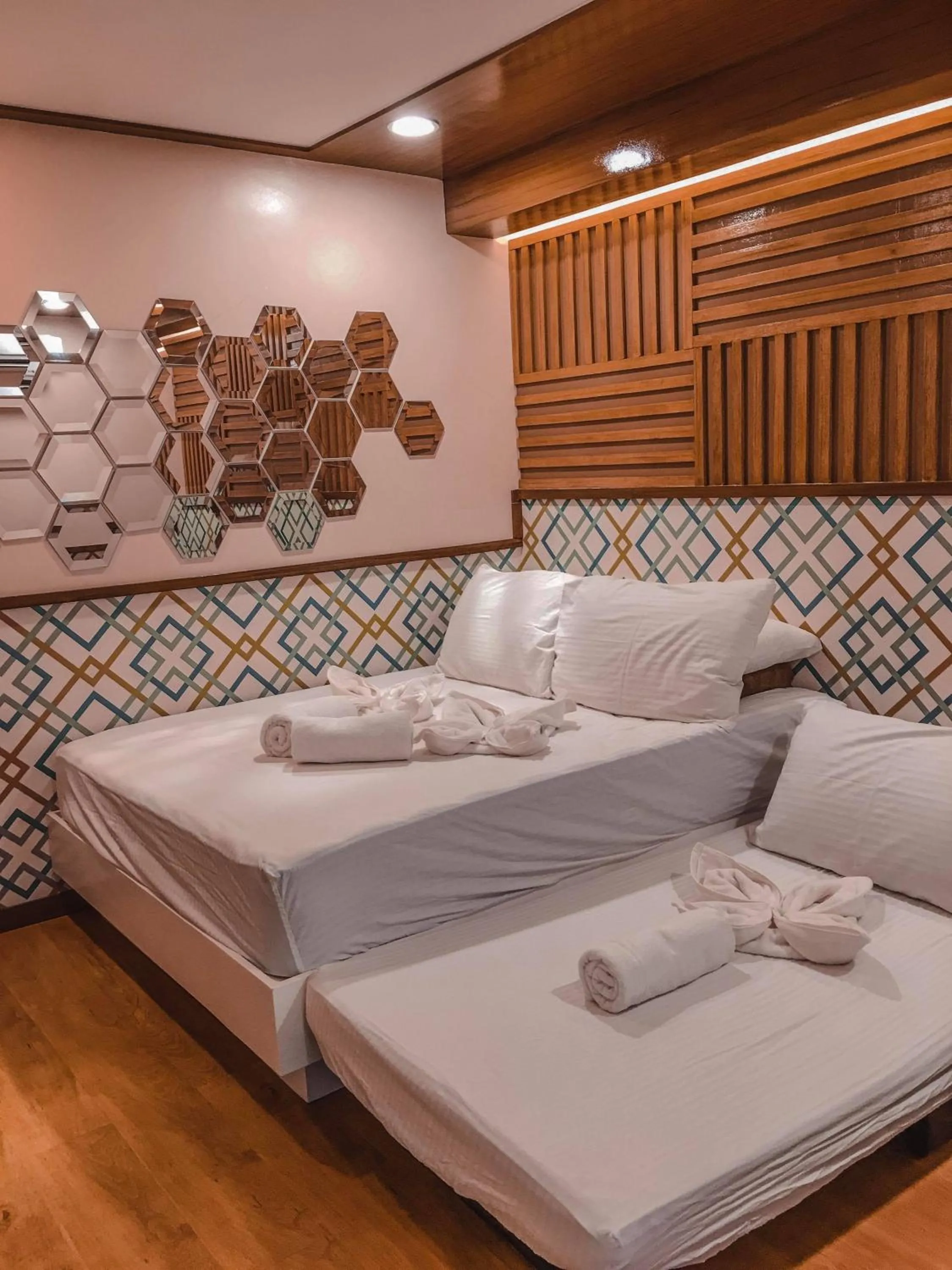 Bed in Noni's Resort