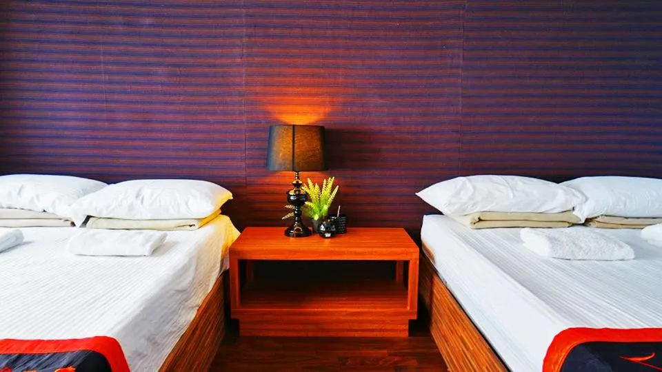 Bed in Noni's Resort