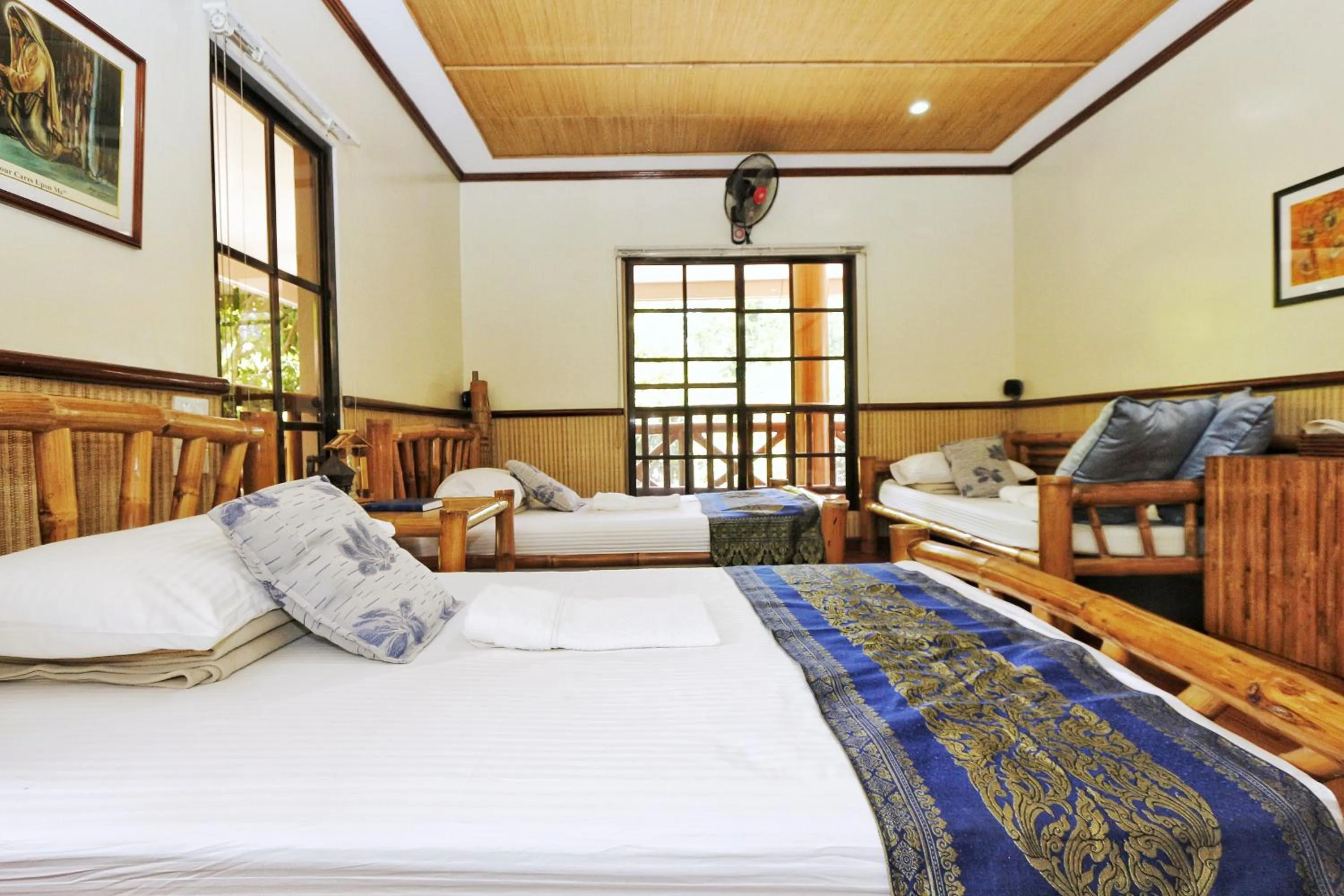 Bed in Noni's Resort