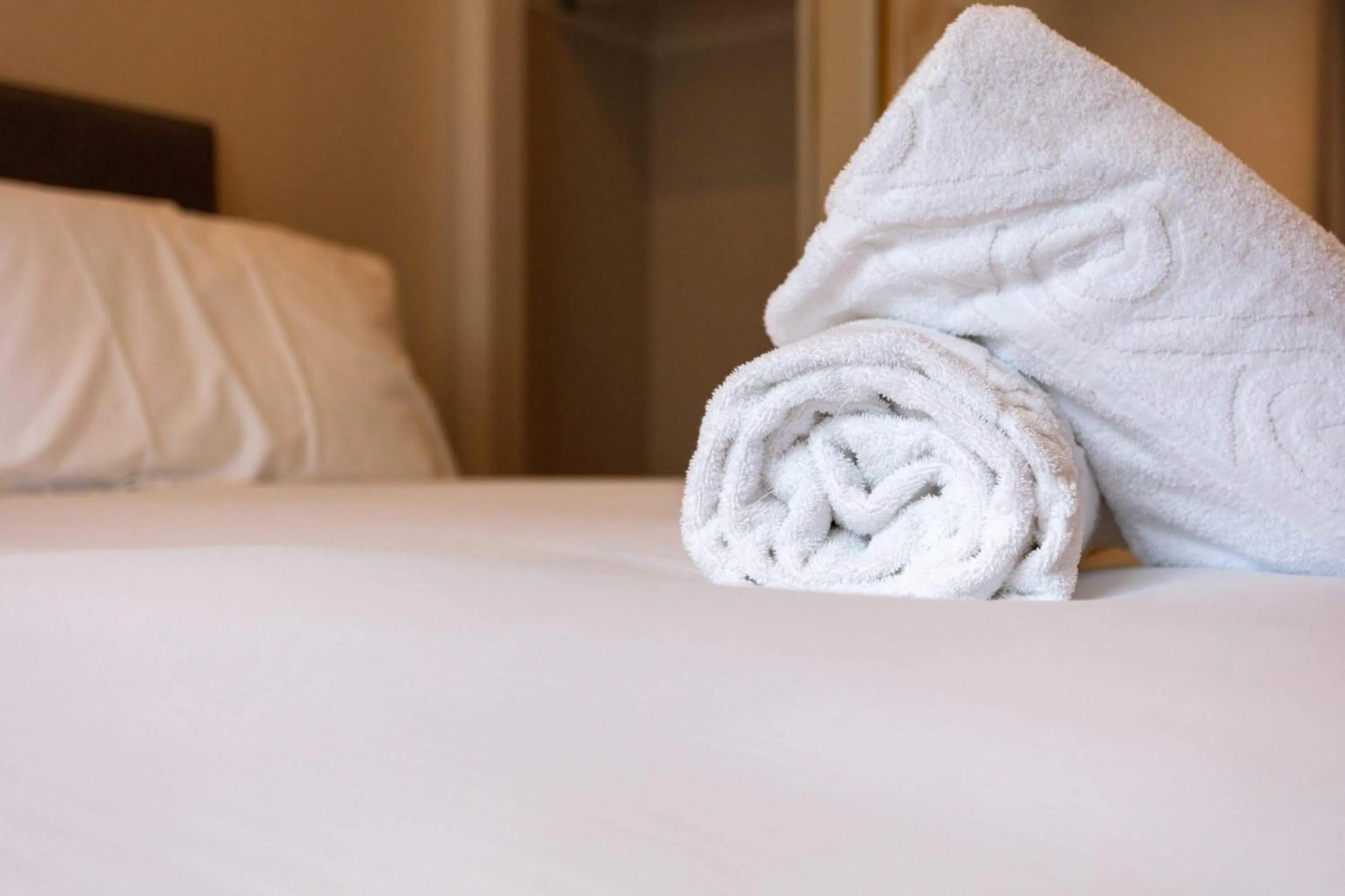 Bed in Harbour House - Donnini Apartments
