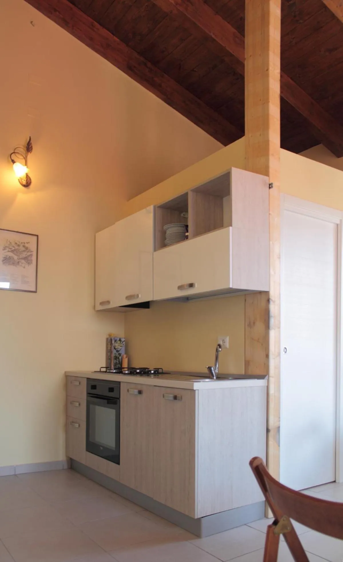 Kitchen or kitchenette in B&B Pinarina